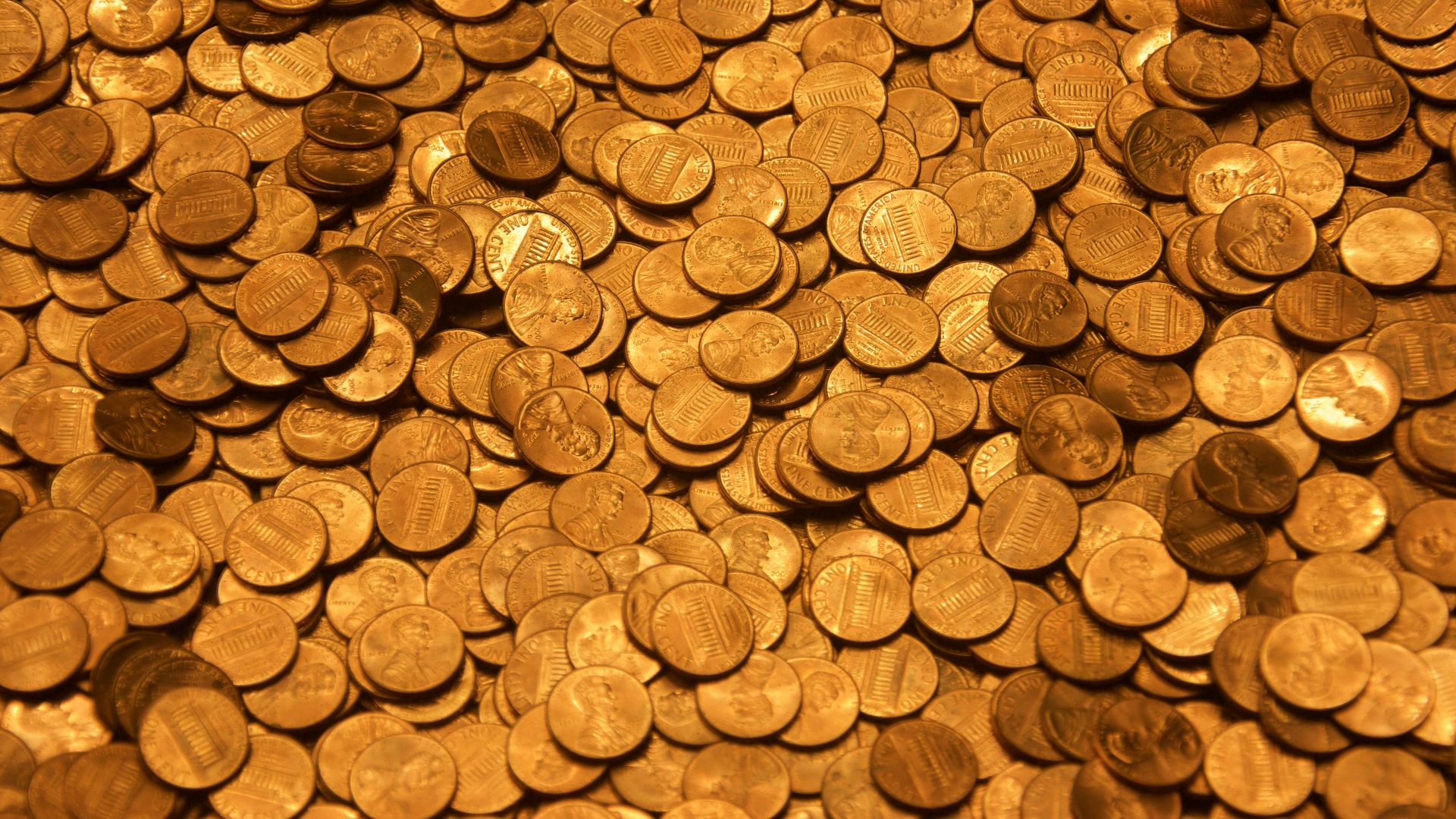 brown round coins on brown wooden surface