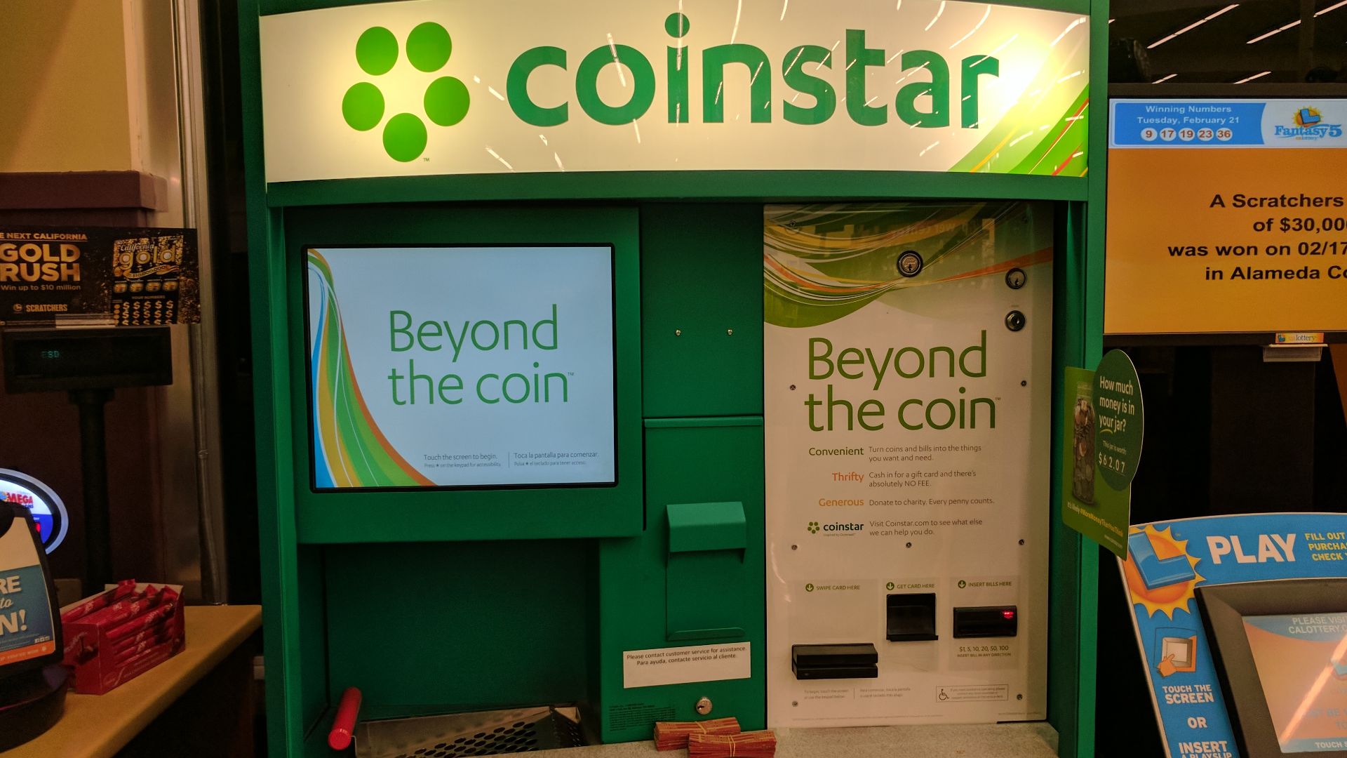 a coin-sorting machine exchanging loose change for scrips or gift vouchers, in the United States of America. See also a video of the machine in action.