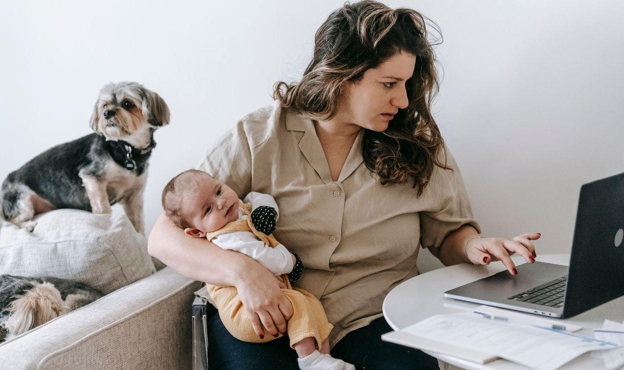 Mother balancing work from home with parenting