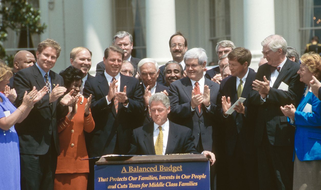 President William Jefferson Clinton Signing the Balanced Budget Act Washington, DC. 8-5-1997 President William Jefferson Clinton signing the Balanced Budget Act of 1997 and the Taxpayer Relief Act of 1997 during a formal ceremony on the South Lawn of the White House.