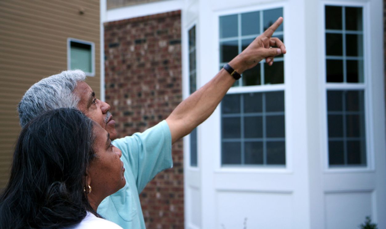 Family together outside their home