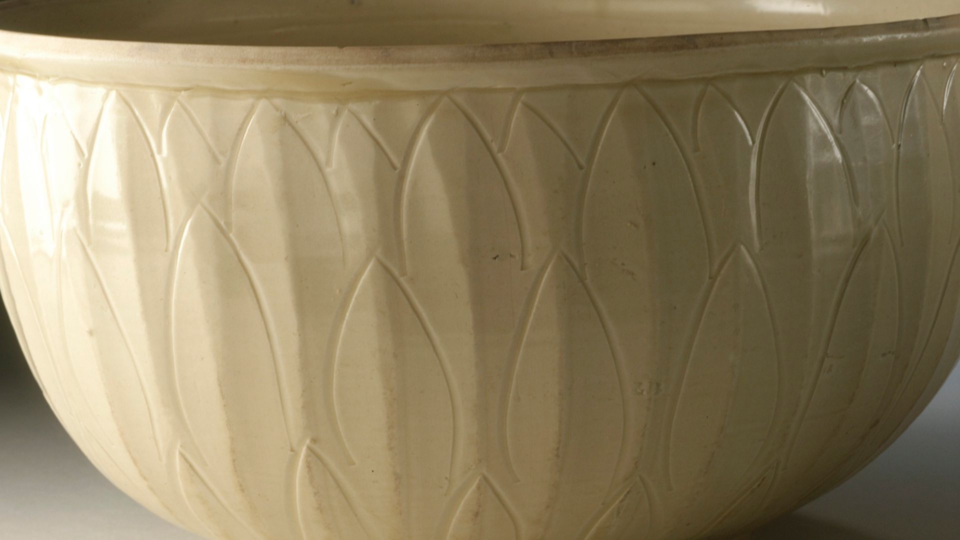 China, Hebei Province, Quyang County, Northern Song dynasty, 960-1127
Furnishings; Serviceware
Ding ware, wheel-thrown stoneware with incised and carved decoration and transparent glaze
Purchased with funds provided by Carl Holmes (M.56.3.1)
Chinese Art