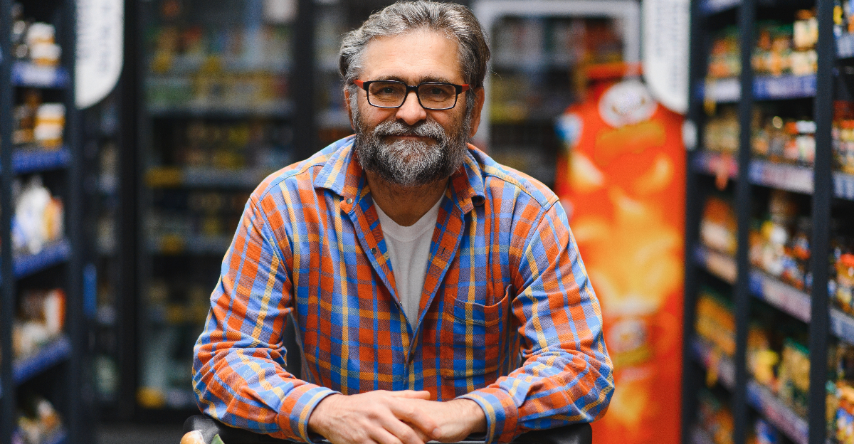 Handsome senior man shopping in a supermarket