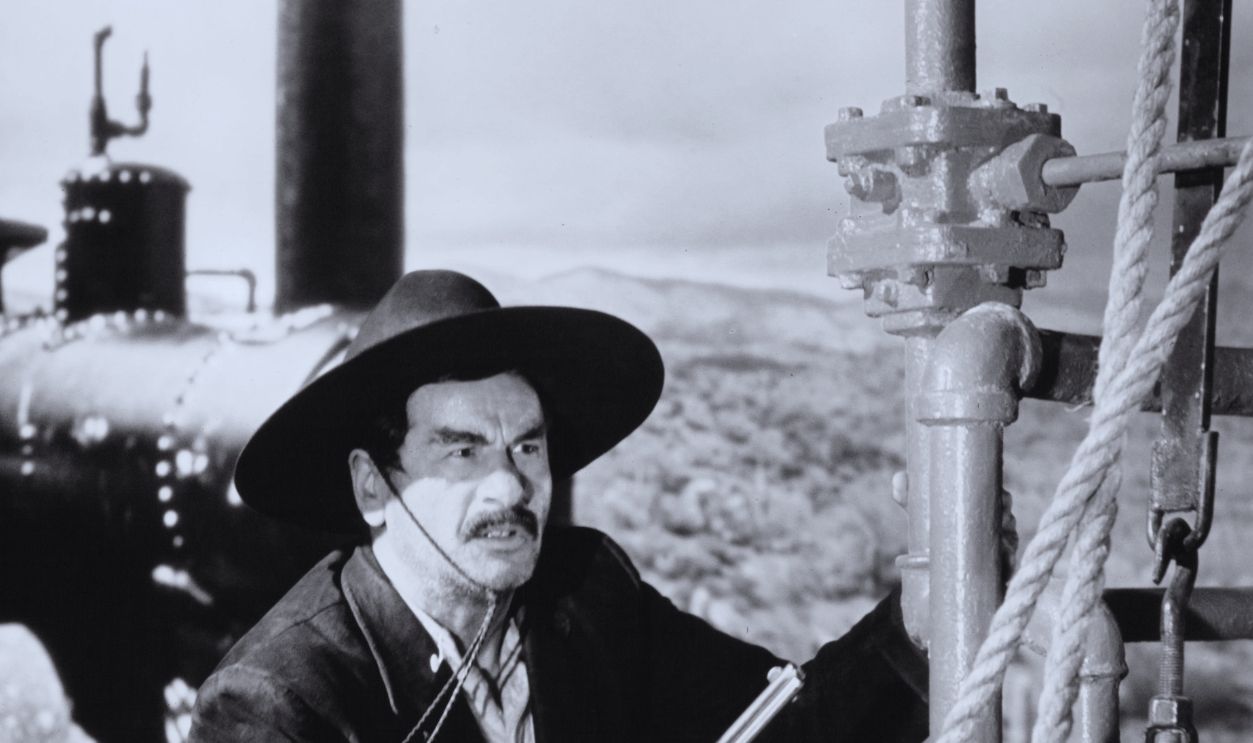 Gettyimages - 129921642, Eli Wallach In 'How The West Was Won' Eli Wallach stages fight to the death with lawmen aboard a runaway train in a scene from the film 'How The West Was Won', 1962.