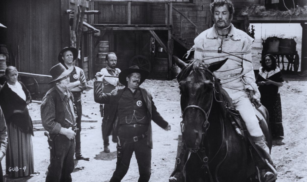 Gettyimages - 131288330, Eli Wallach And Clint Eastwood In 'The Good, The Bad And The Ugly' As the sheriff prepares to whip the horse from under Eli Wallach, Clint Eastwood fires from a nearby stable to cut Eli's noose in a scene from the film 'The Good, The Bad And The Ugly', 1966. 