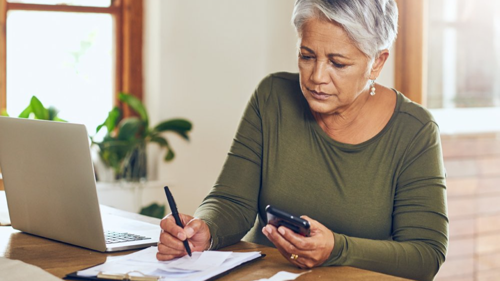 Senior woman, budget planning and health insurance checklist