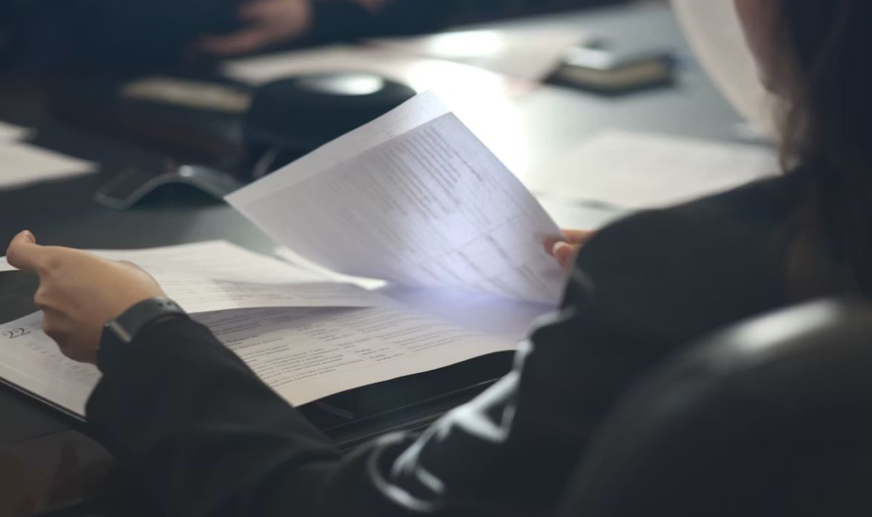 person reading document 