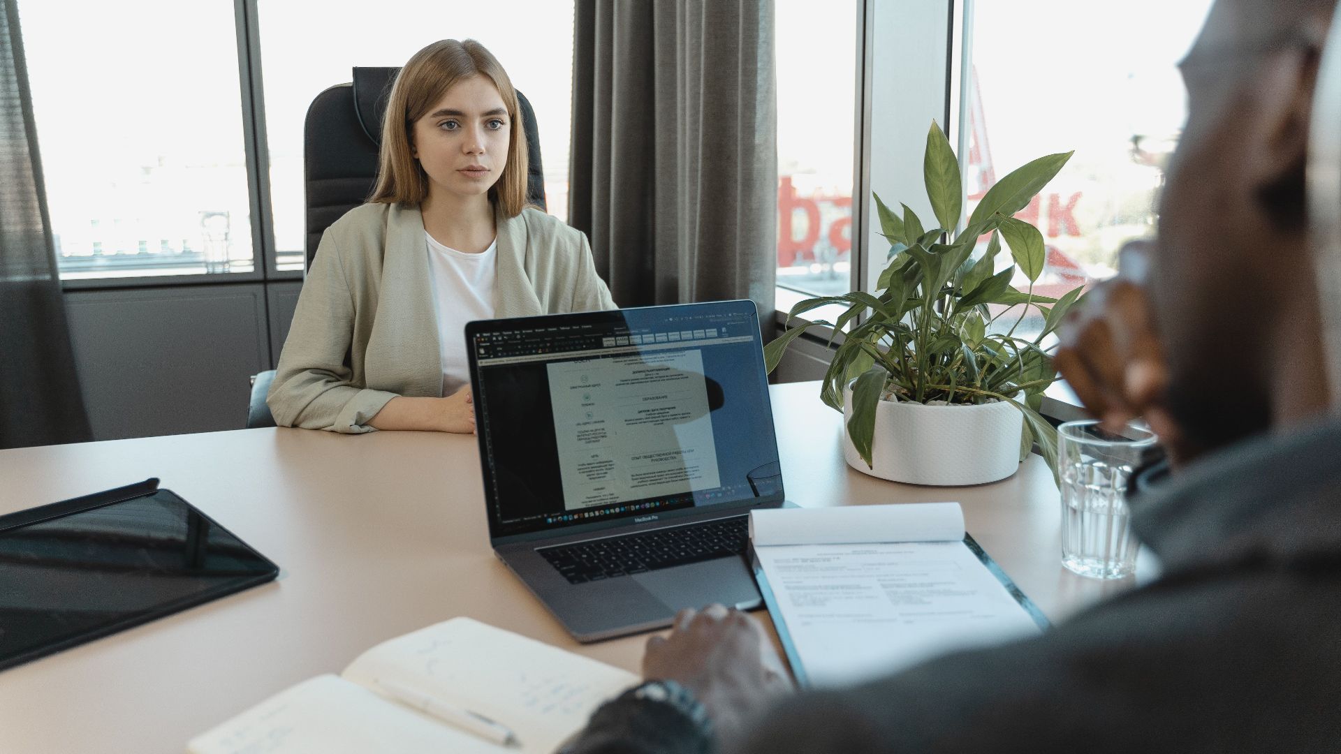 A professional job interview scene in a modern office setting, emphasizing recruitment and career opportunities.