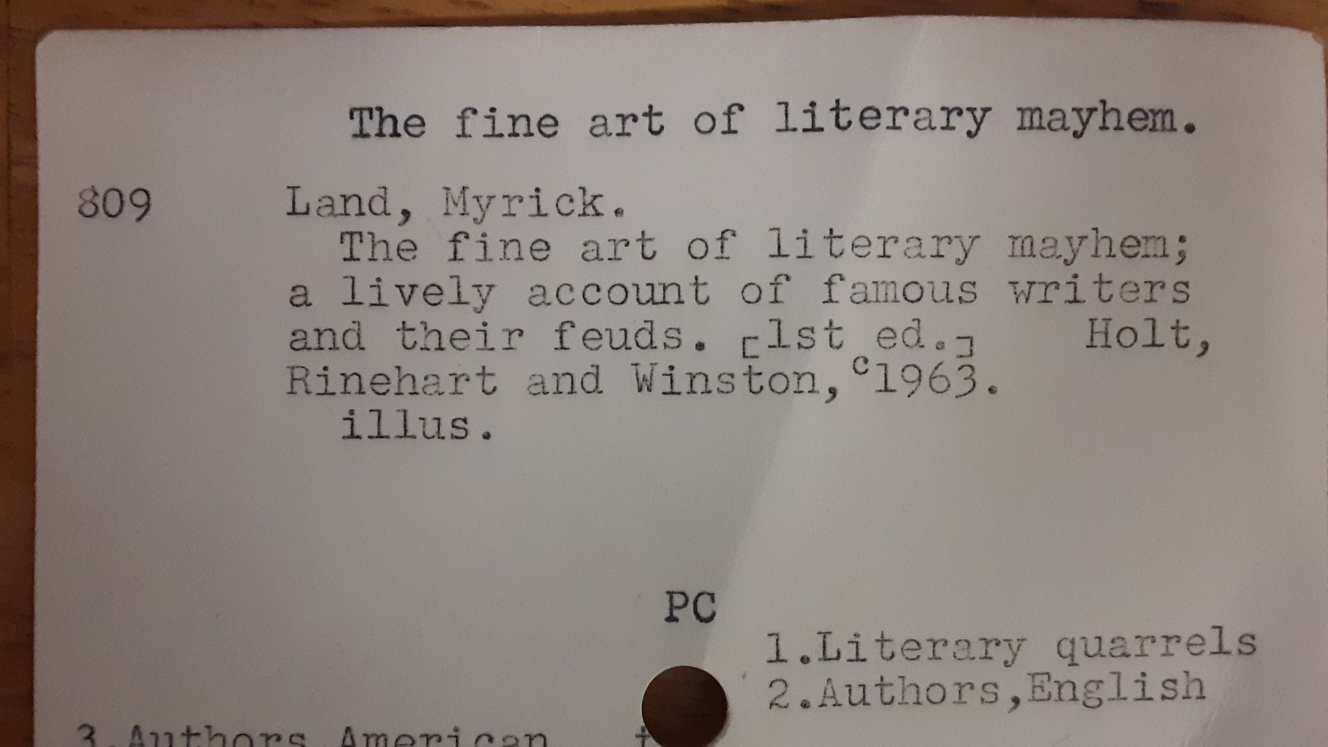 Card from a library card catalog: The fine art of literary mayhem by Myrick Land