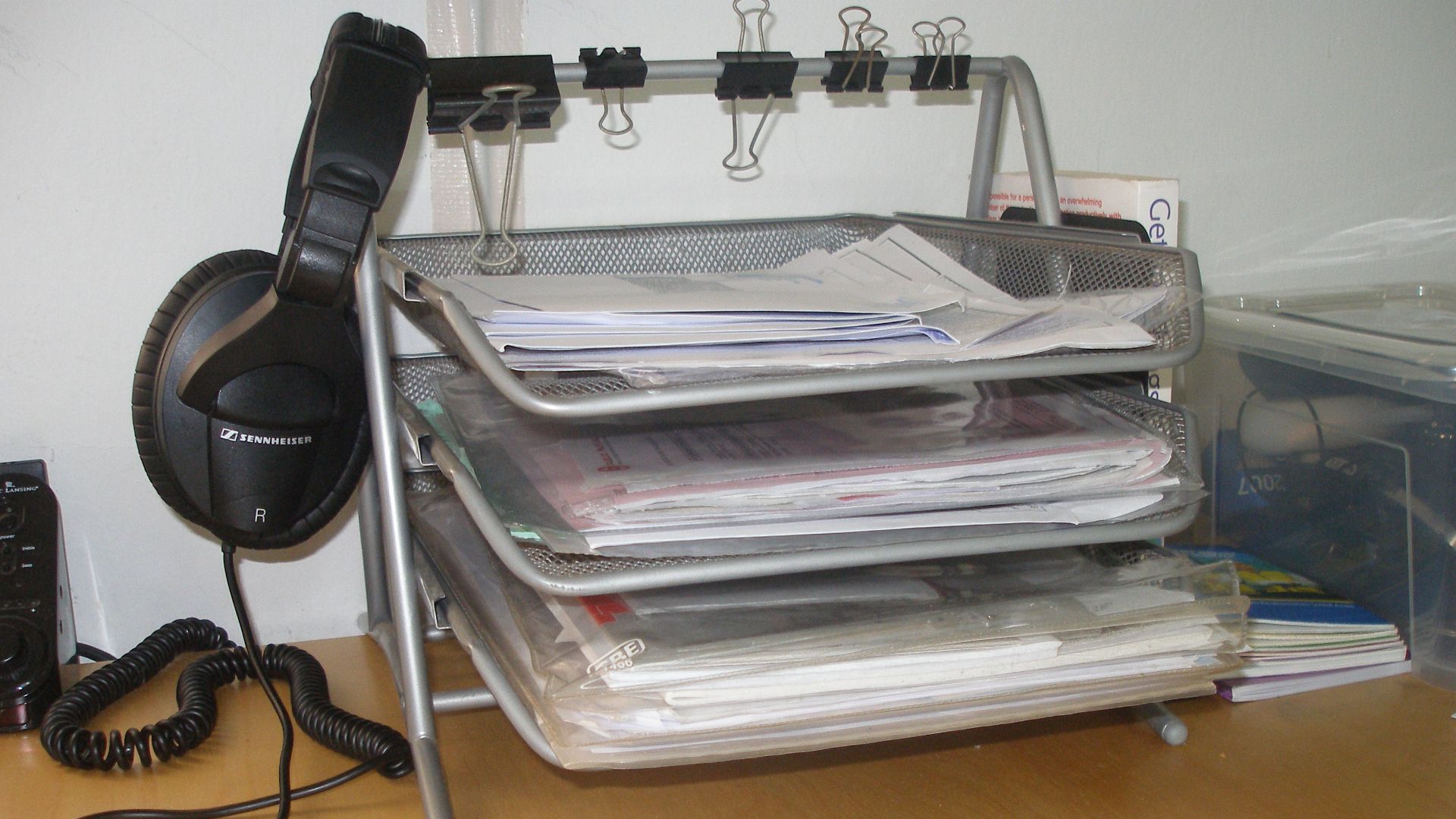 Three filled inbox trays