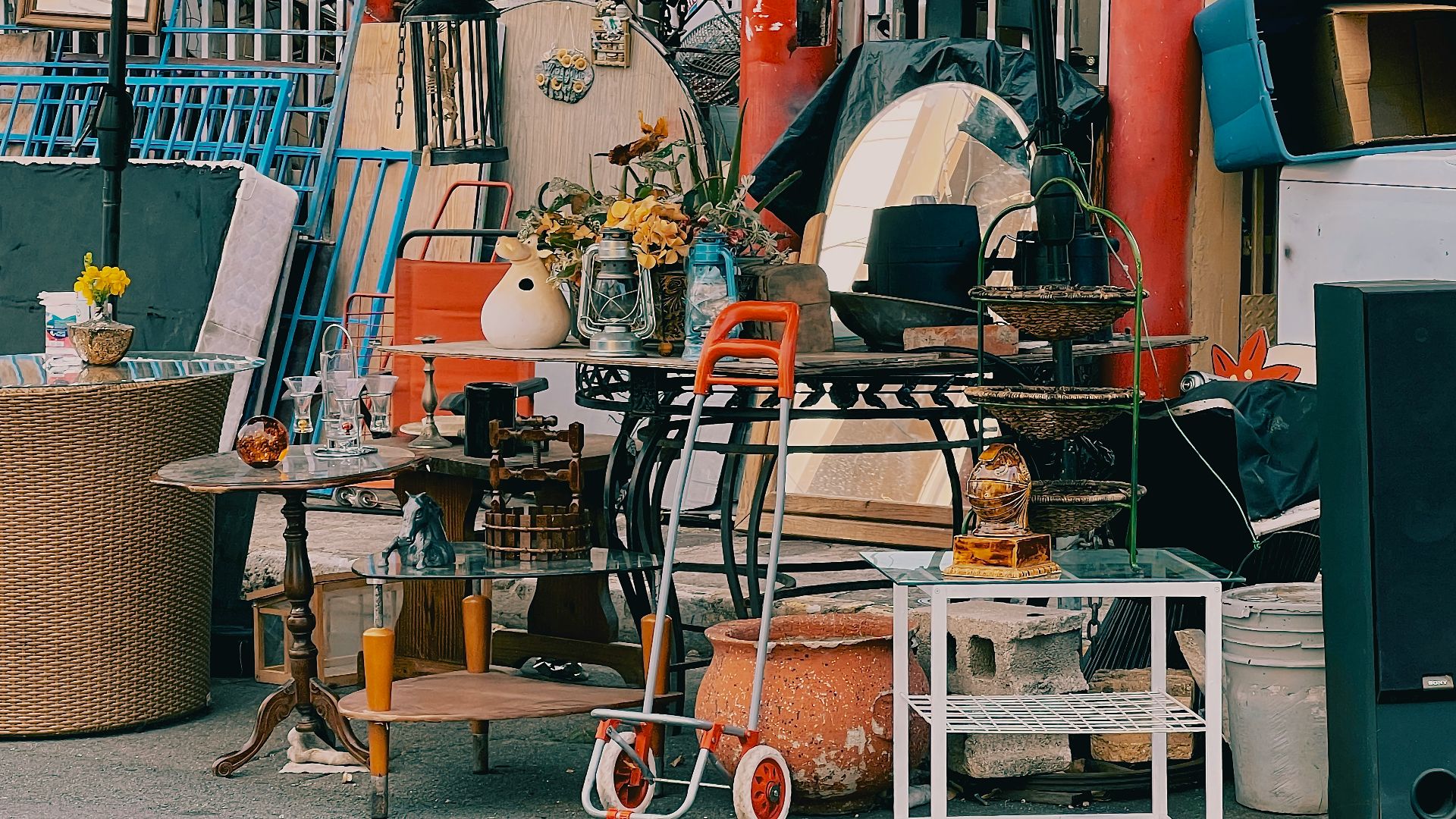 a pile of junk sitting on the side of a road