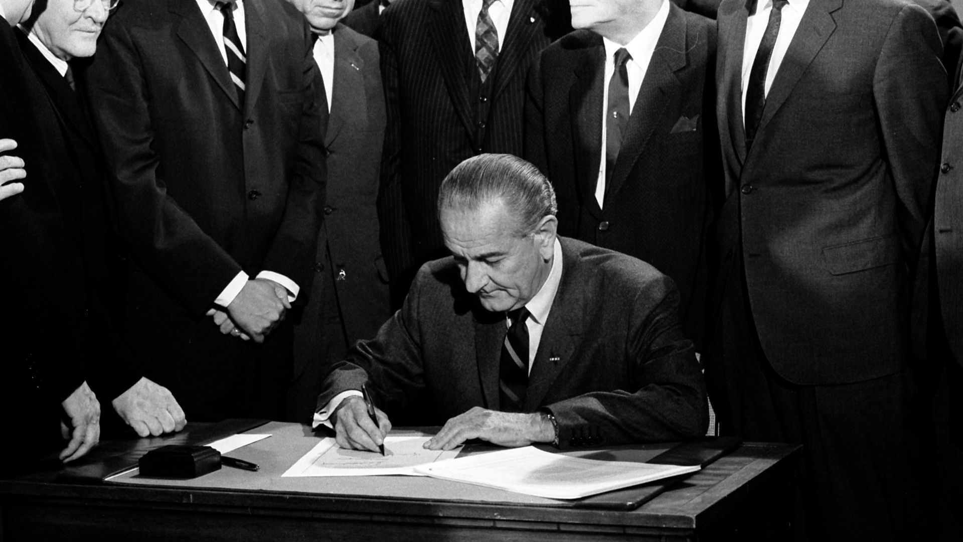 U.S. President Lyndon B. Johnson signing the Civil Rights Act of 1968