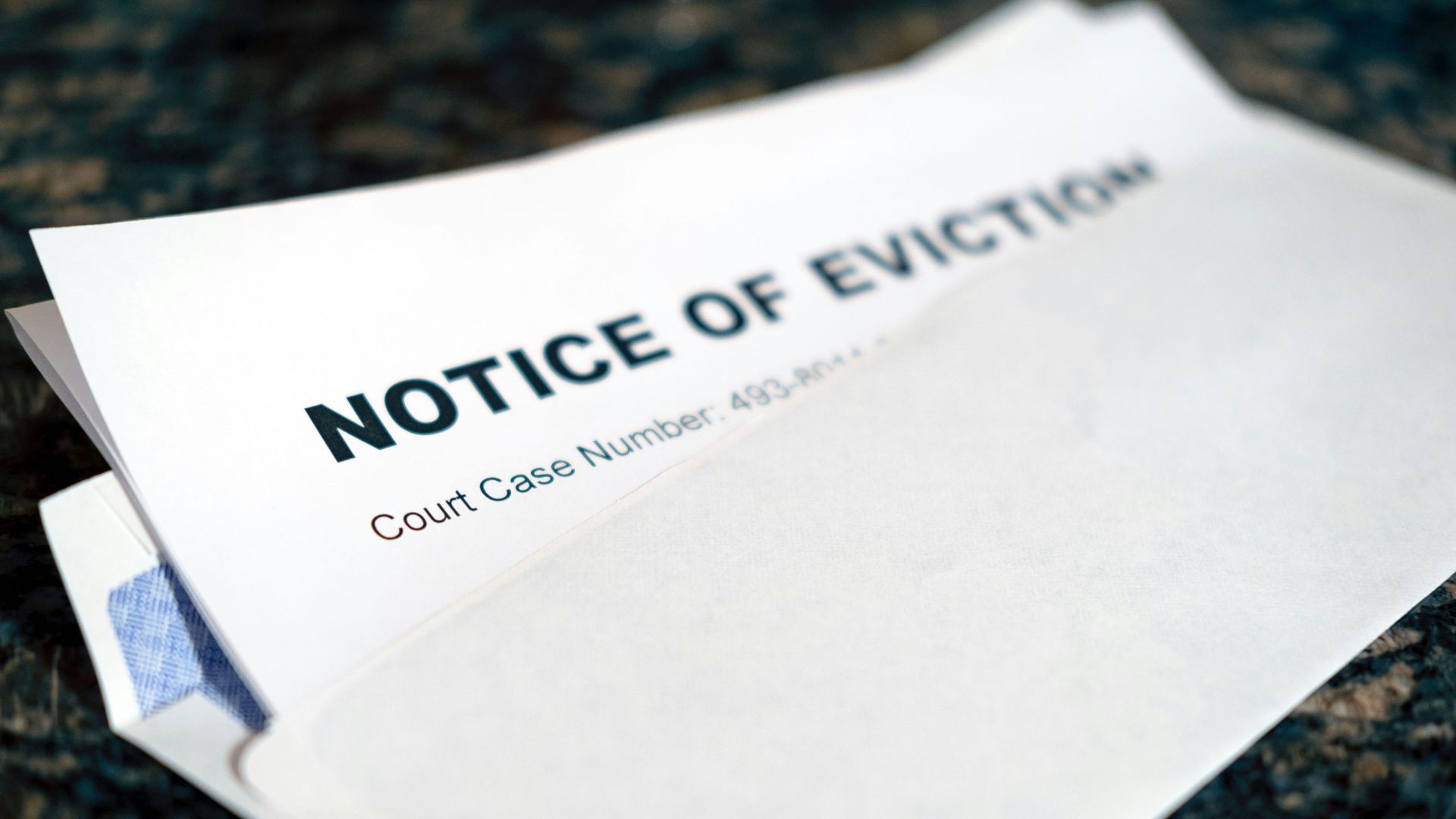a close up of a piece of paper with a notice of eviction on it