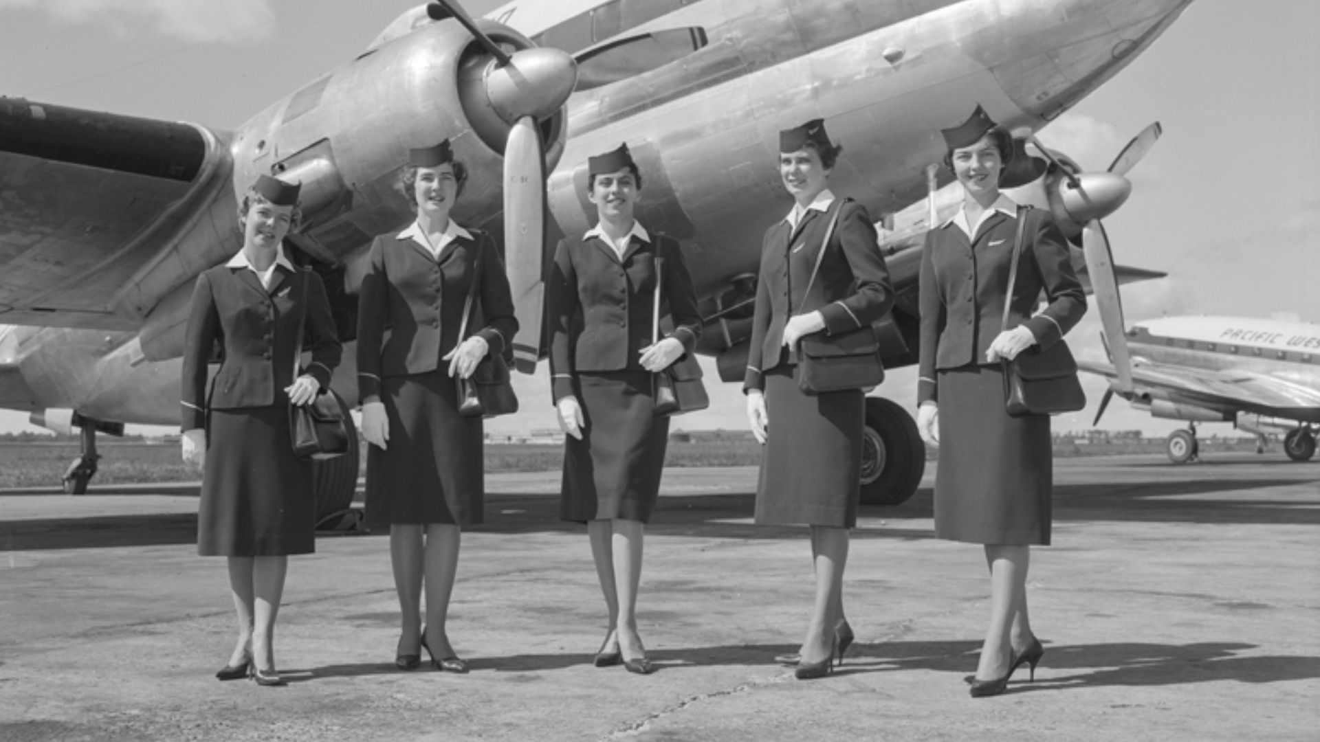 Pacific Western Airlines Ltd. flight attendants, Edmonton, Alberta, 1960 
Provincial Archives of Alberta, WS.337.

From the Wells Photographic Studios fonds.