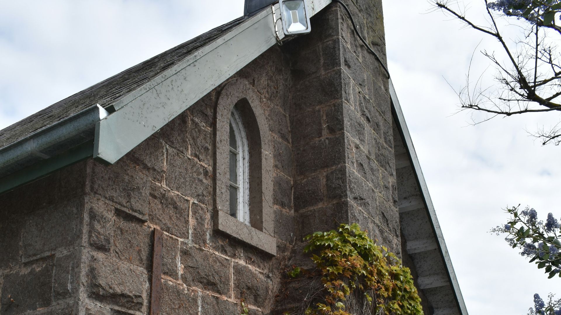 a stone building with a tower