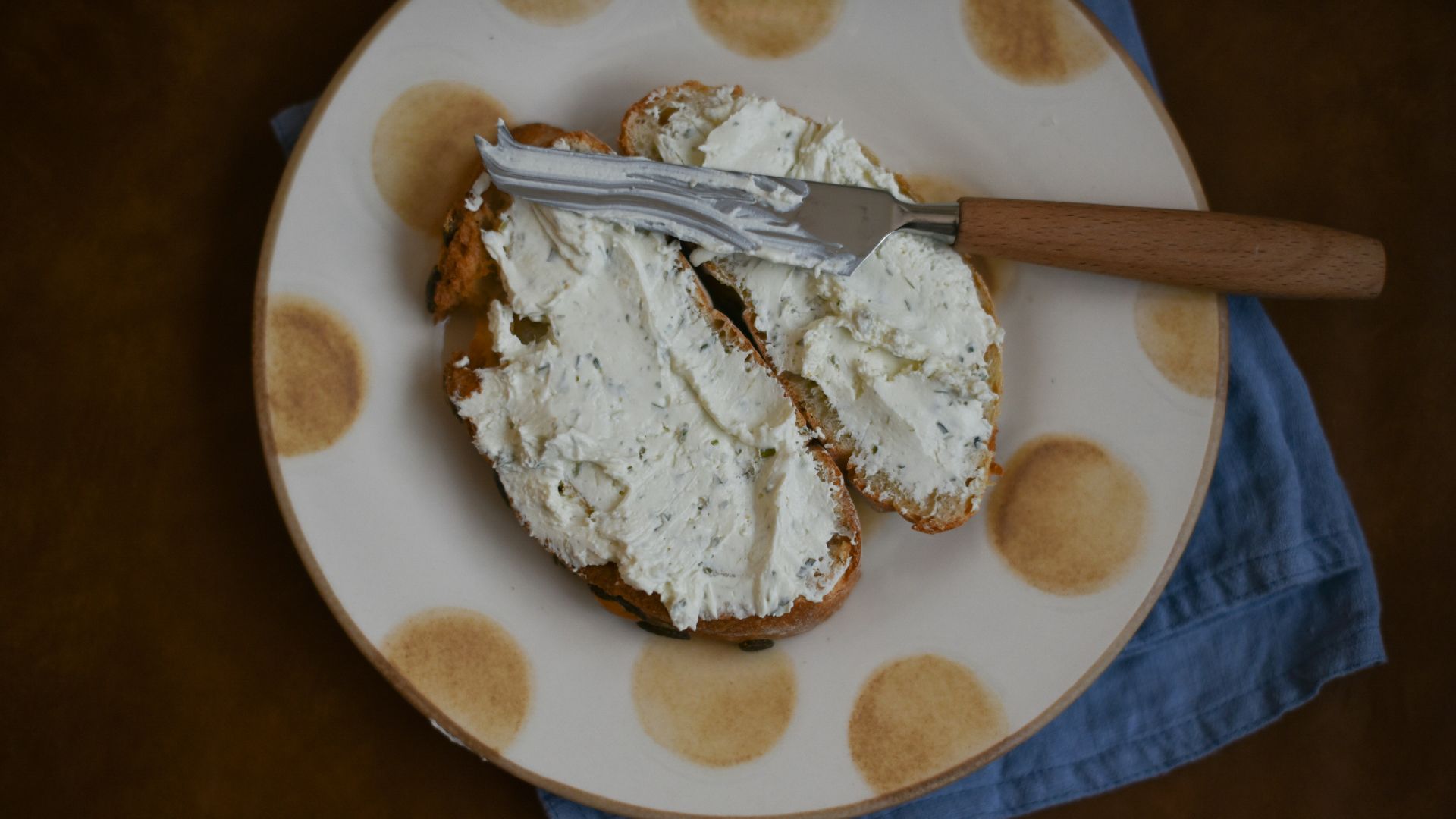 bread with white creme on plate