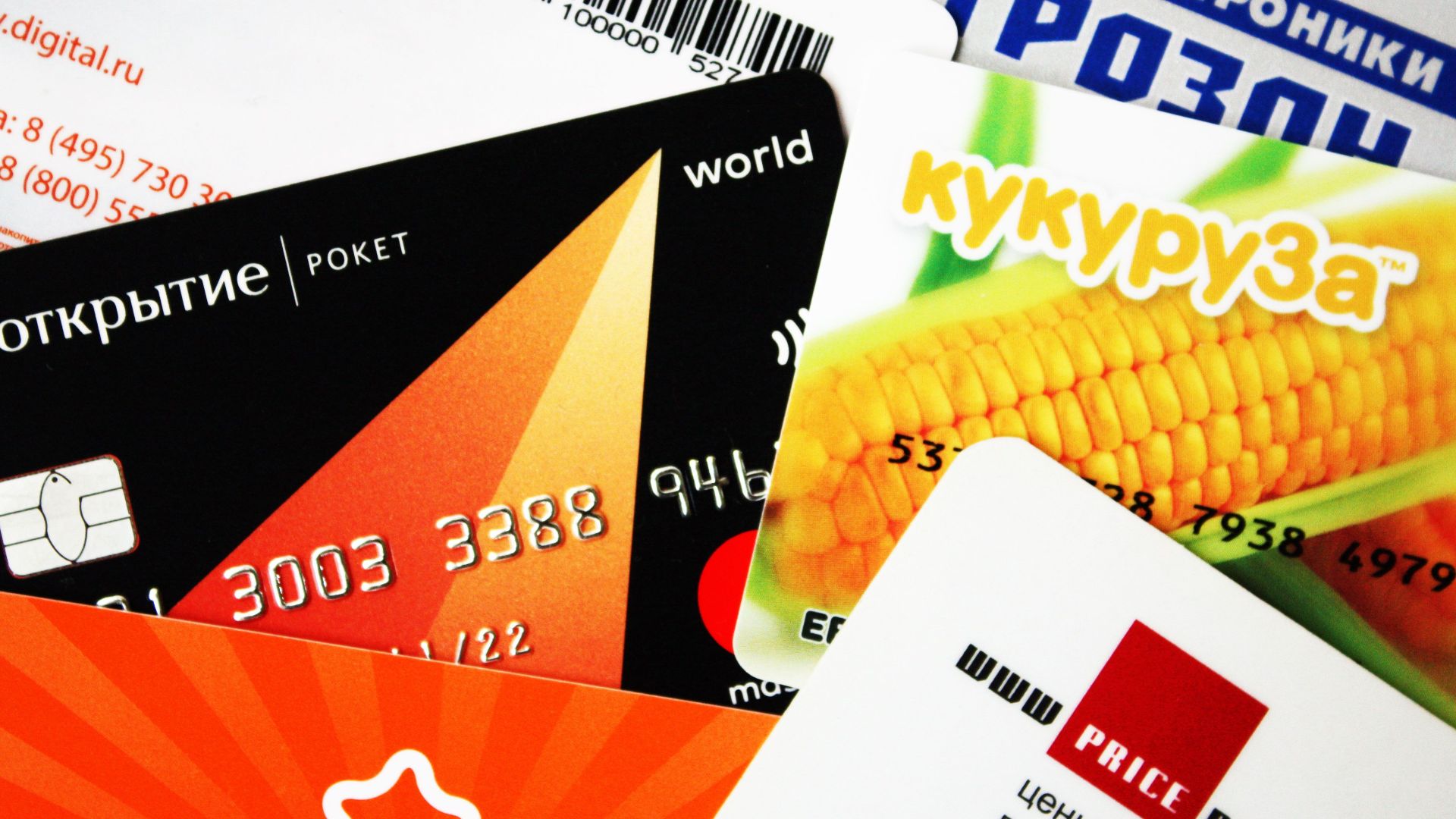 A mix of various credit and gift cards, showcasing a close-up view.