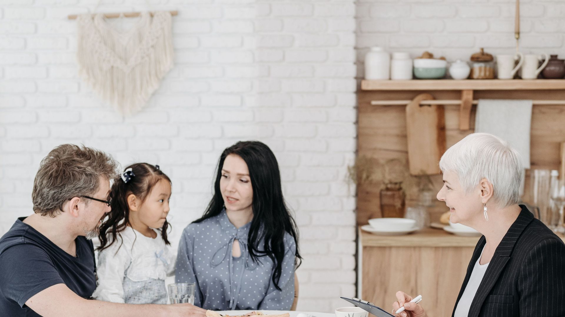A cheerful family meeting around a table in a cozy home setting, fostering bonds and conversations.