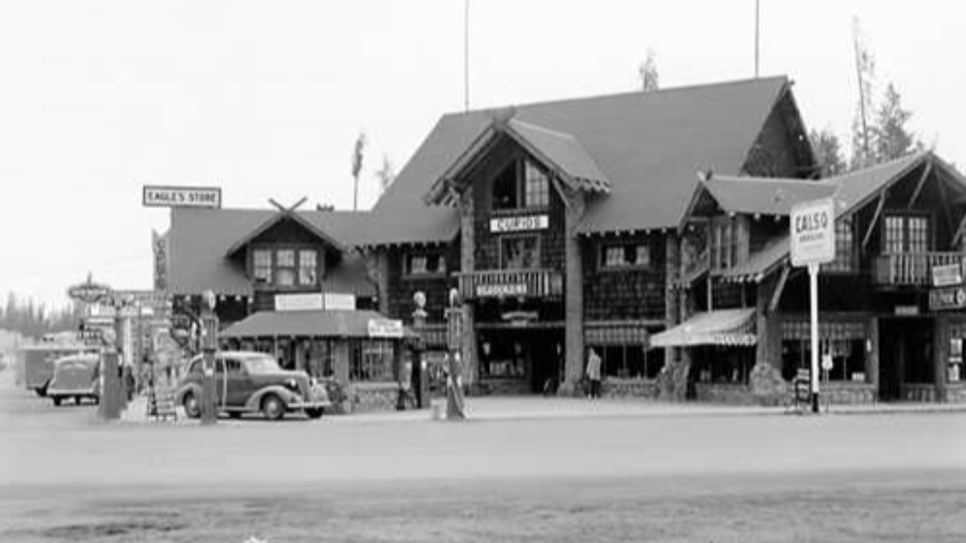 Advertising (concessions) signs along the main street of West Yellowstone, Montana. Eagle's Store (rustic structure) at Yellowstone, USA
