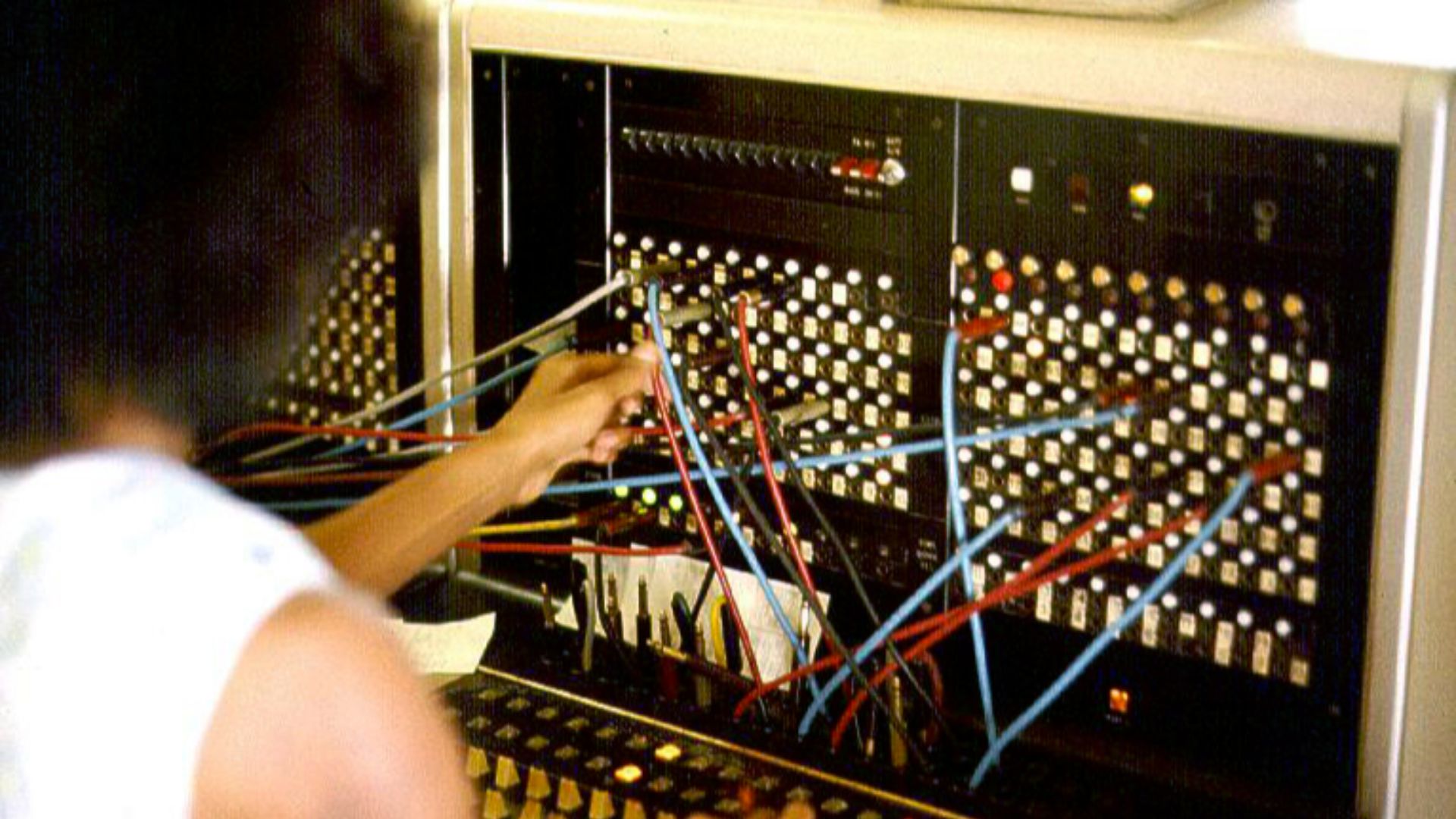 Jersey Telecom telephone operator at switchboard, 1975