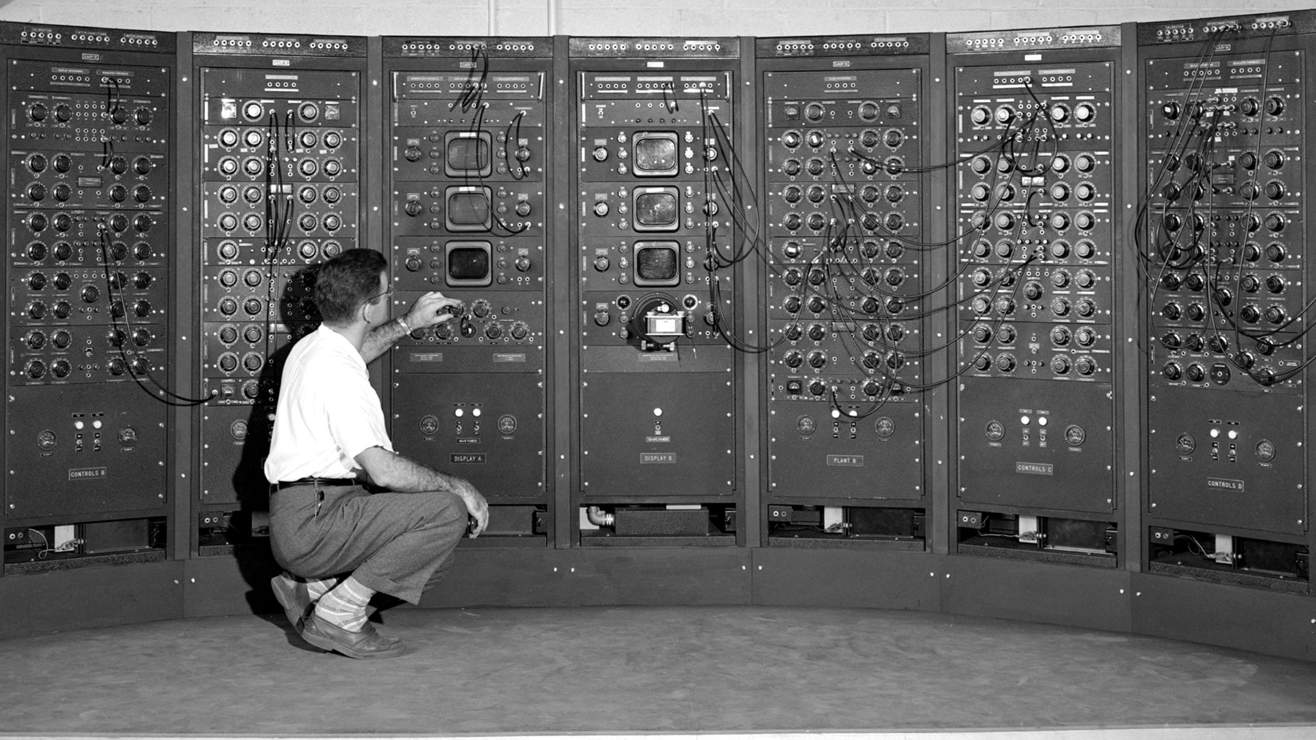 Analog Computing Machine in the Fuel Systems Building. This is an early version of the modern computer. The device is located in the Engine Research Building at the Lewis Flight Propulsion Laboratory, now John H. Glenn Research Center, Cleveland Ohio.