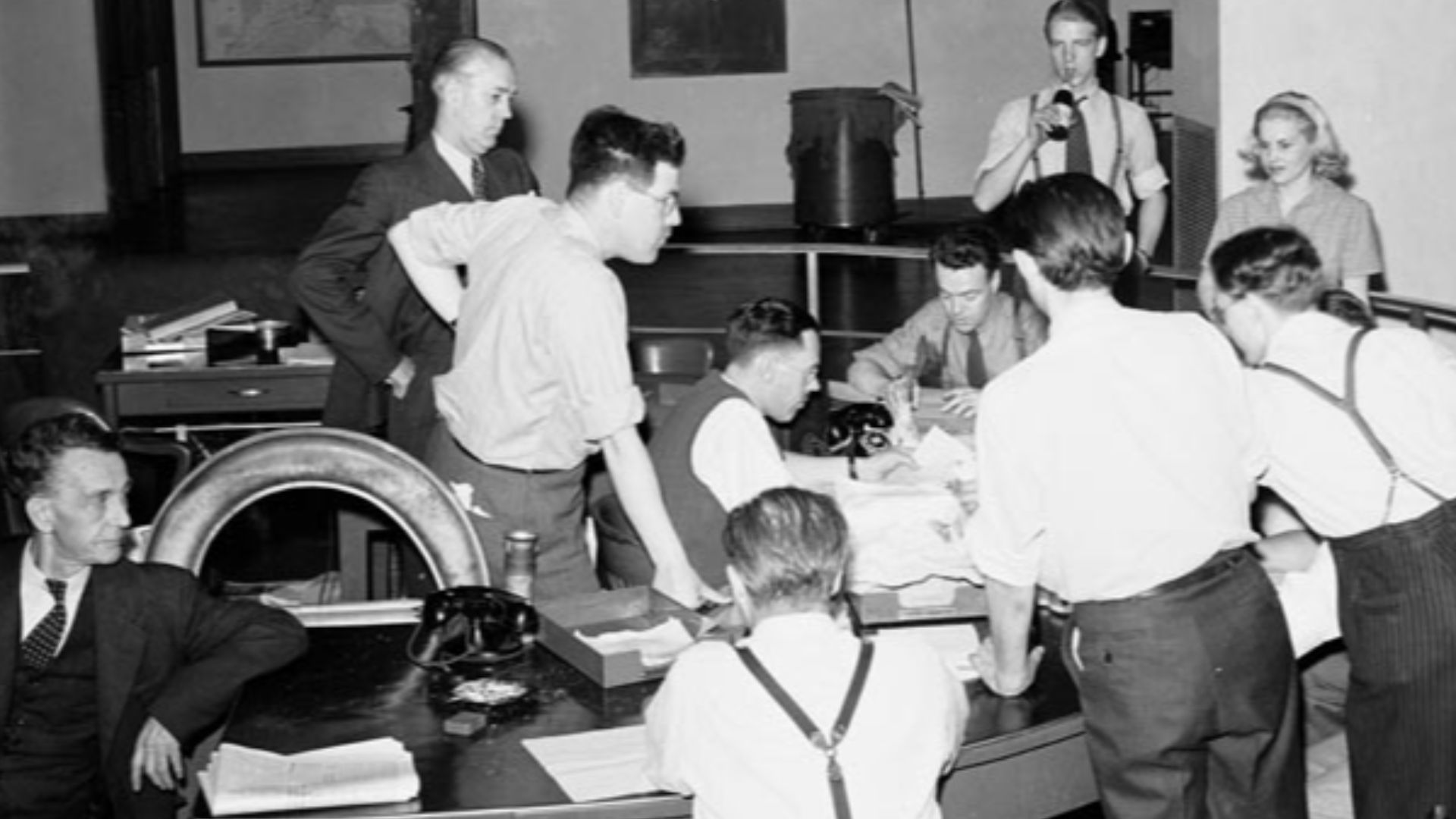 Globe and Mail newspaper staff wait for news of the D-Day invasion.  Toronto, Canada.