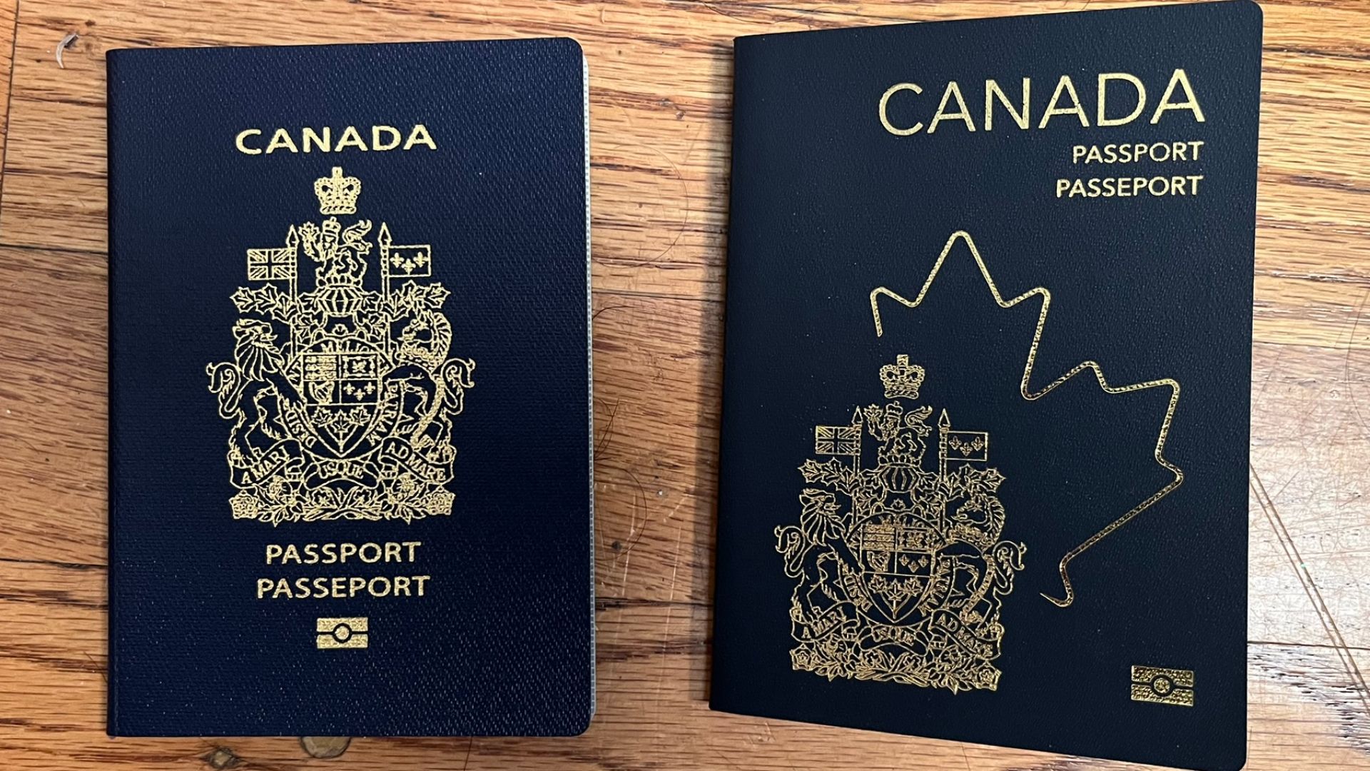 Canadian passports from old and new series.
