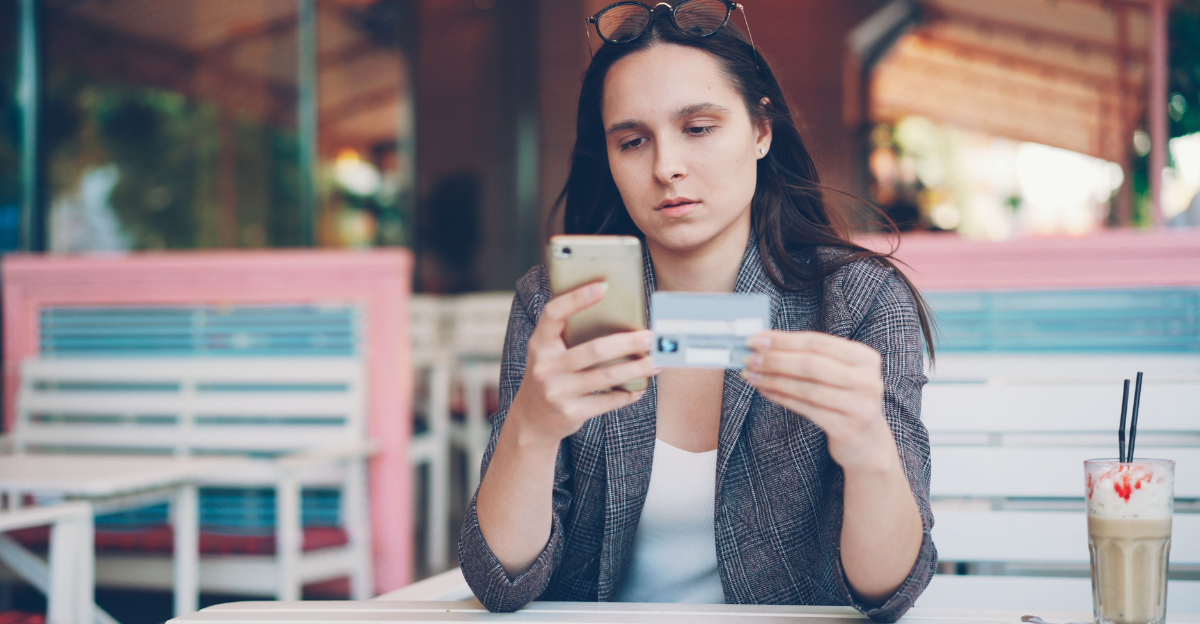 woman-shopping-online-with-credit-card-and-phone
