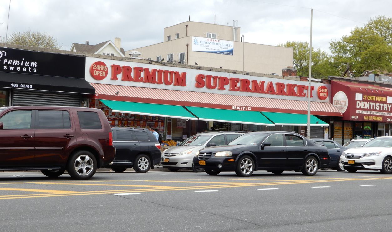 JAMAICA, NY - May 6, 2019: Store front of Premium Supermarket, a local Bangladeshi grocery store in Jamaica Queens.