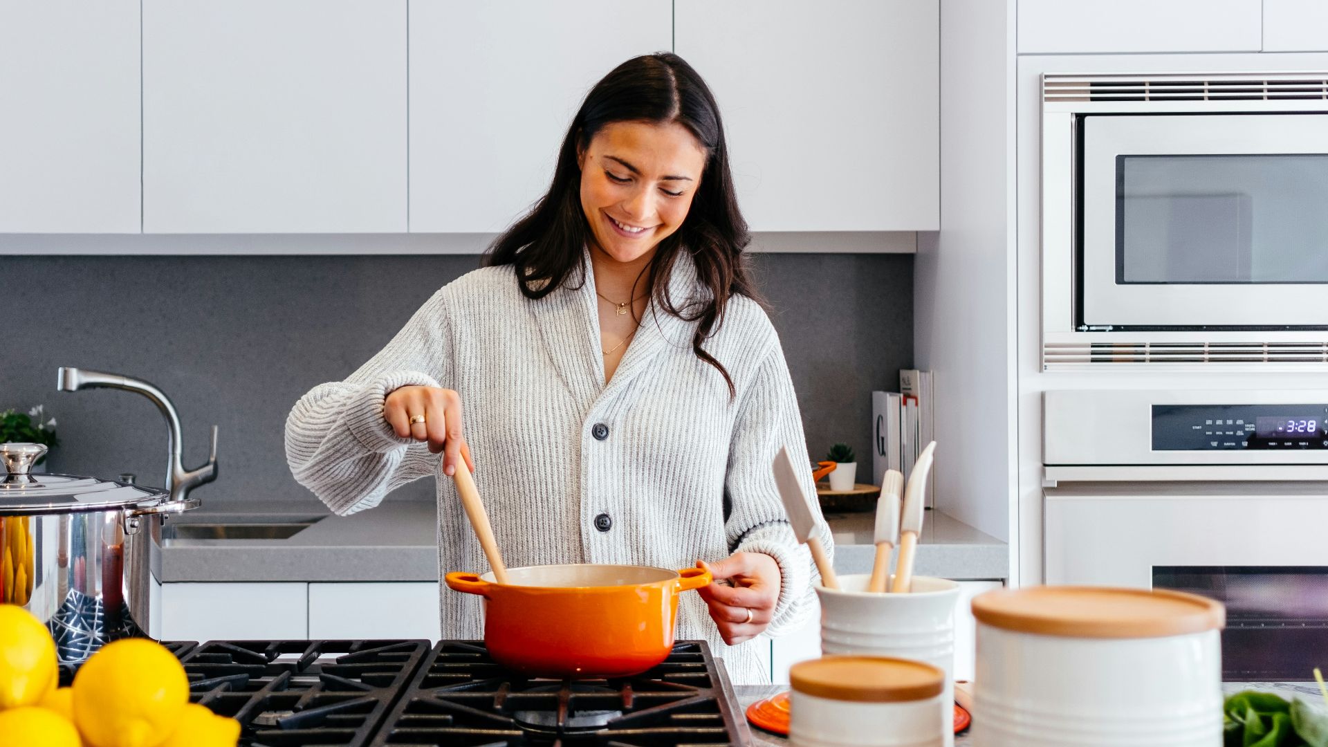 woman cooking inside kitchen room