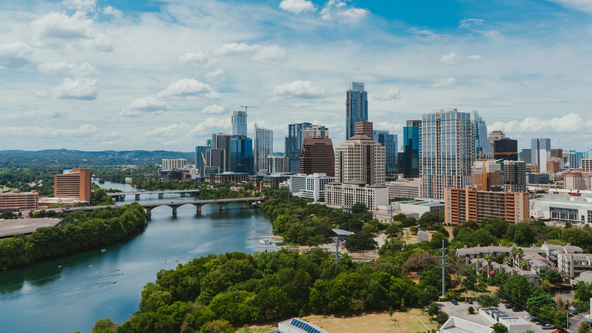 river near buildings during daytime
