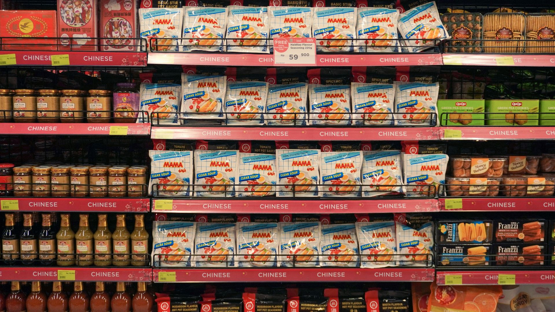 a display in a grocery store filled with lots of food