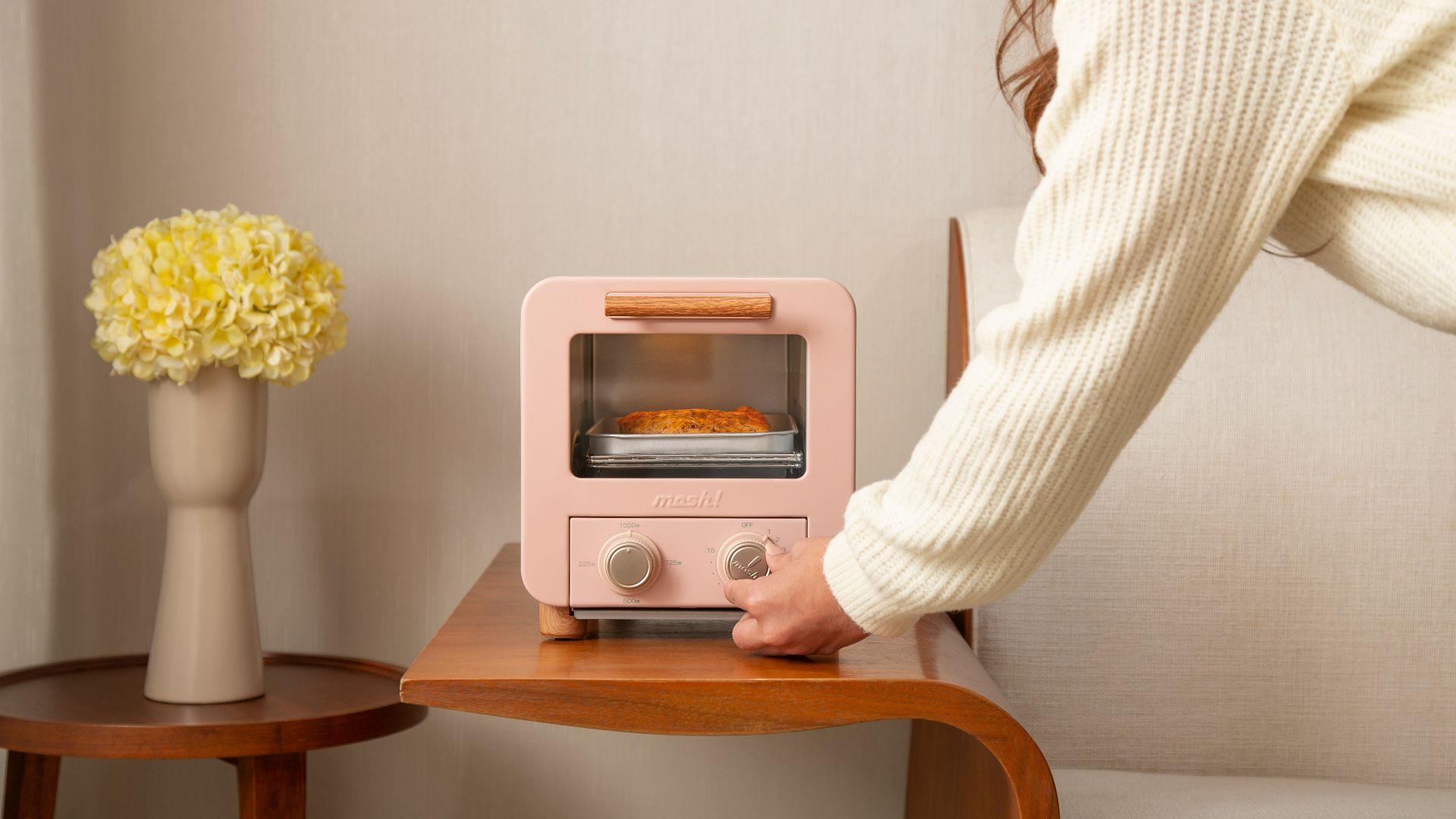 a person using a microwave