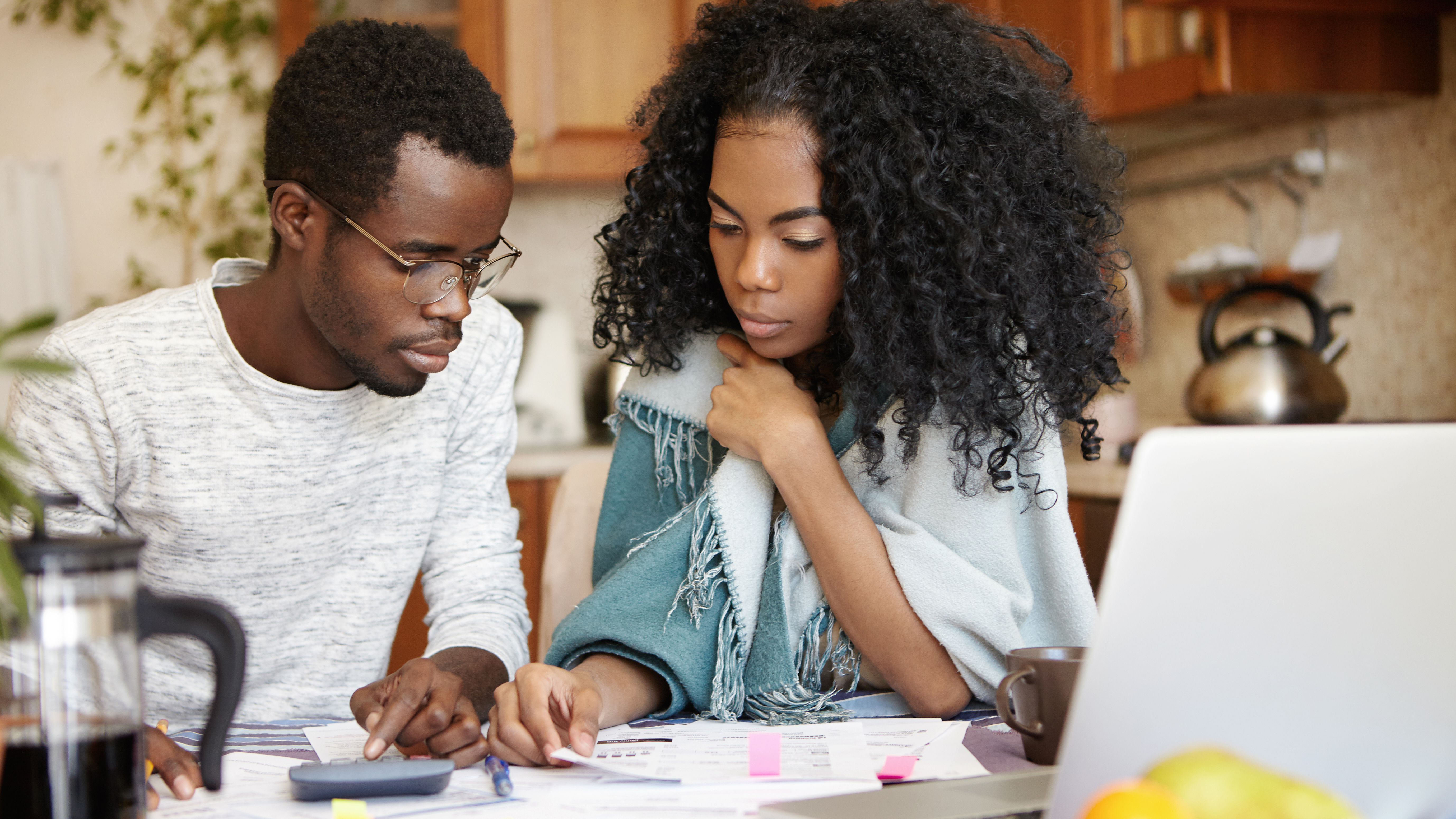 A couple doing paperwork together