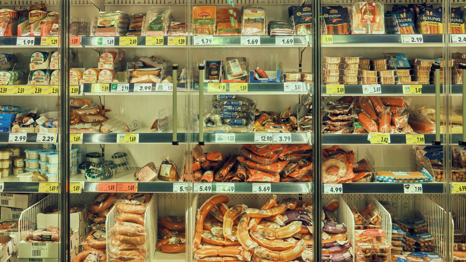a display case filled with lots of different types of food