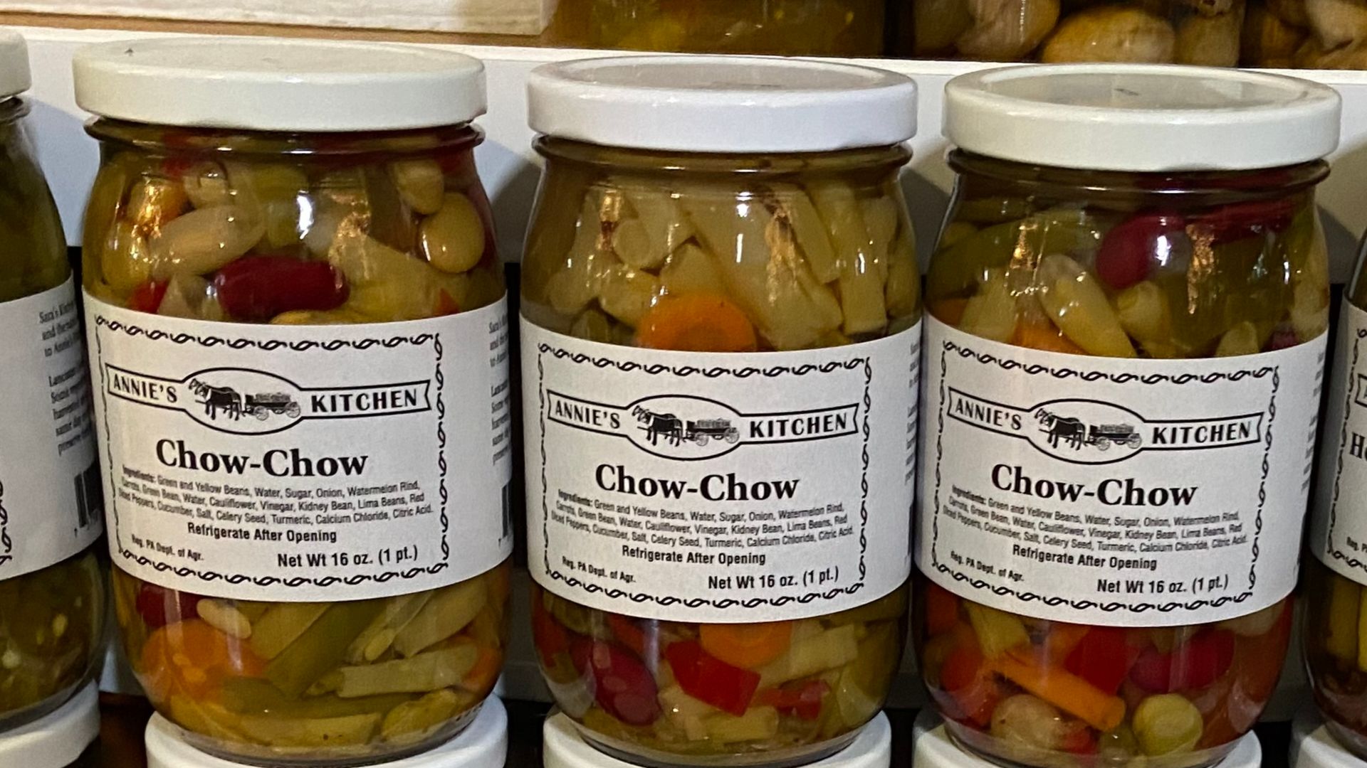 The Chow Chow Relish is a product of Annie's Kitchen. Also on display are jars of Pickled Mushrooms, Hot Garlic Dill Pickles, Four Bean Salad and Dynamite Dill Pickles, all by the same manufacturer.