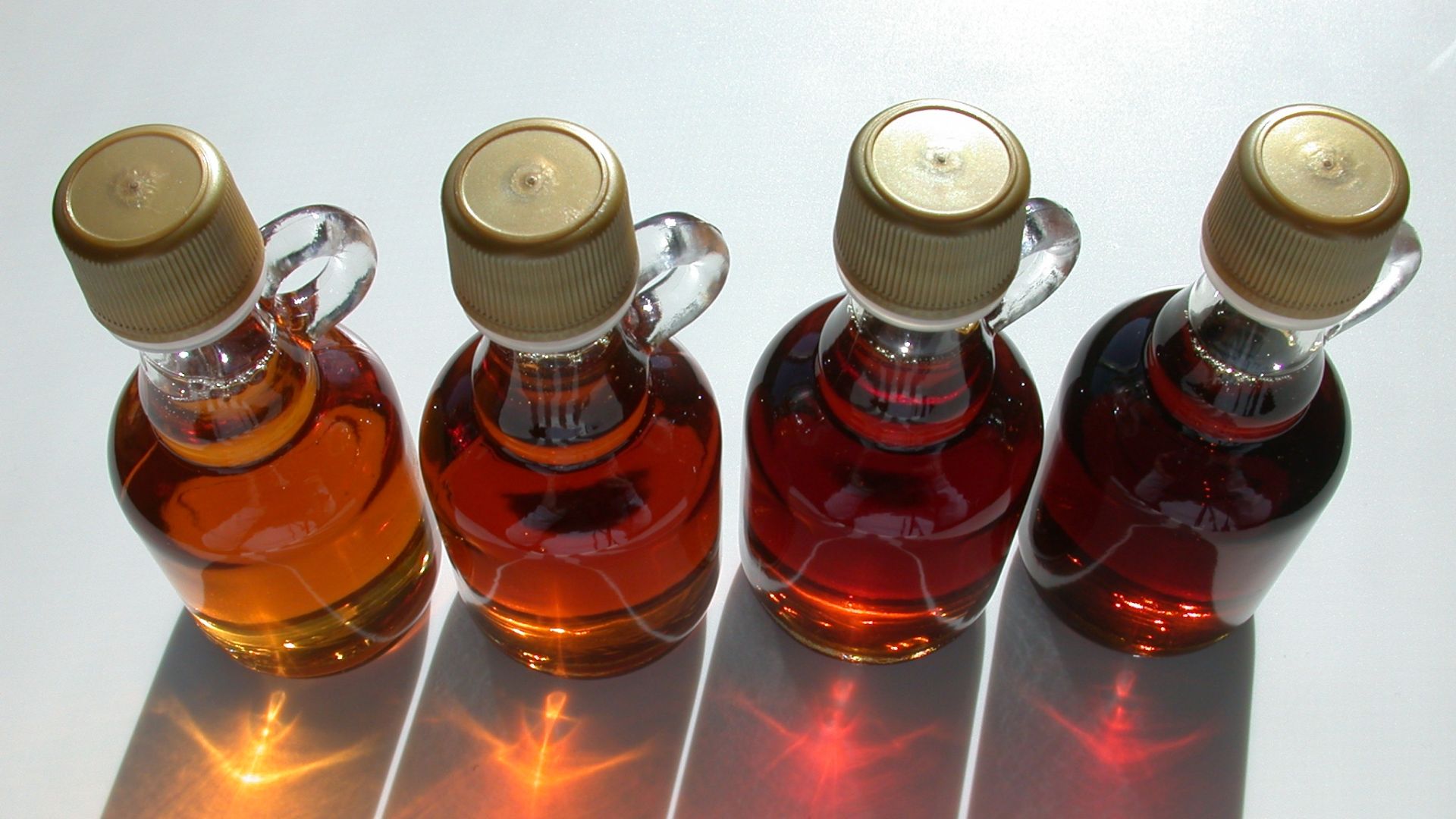 Vermont maple syrup. Grade A varieties, left to right: Golden Colour and Delicate Taste (previously