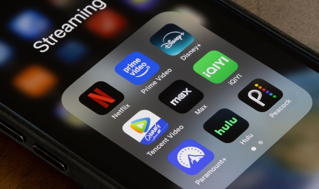 Portland, OR, USA - Apr 1, 2025: Top streaming apps by subscribers, including Netflix, Amazon Prime Video, Disney+, Tencent Video, Max, iQIYI, Paramount+, Hulu, and Peacock, are seen on an iPhone.