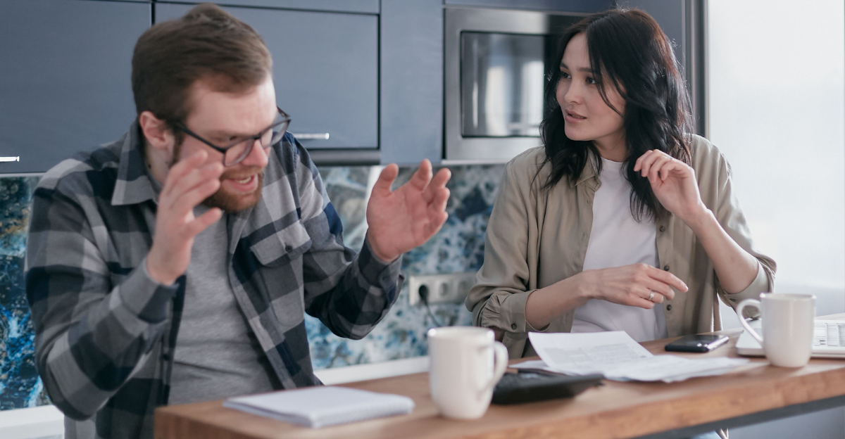 anxious-man-talking-to-a-woman-sitting-beside-him