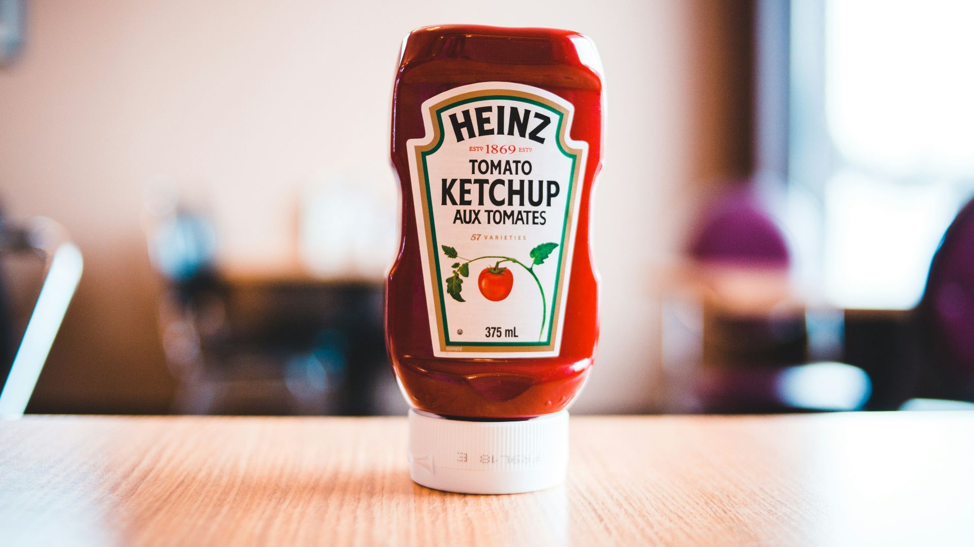 heinz tomato ketchup bottle on brown wooden table