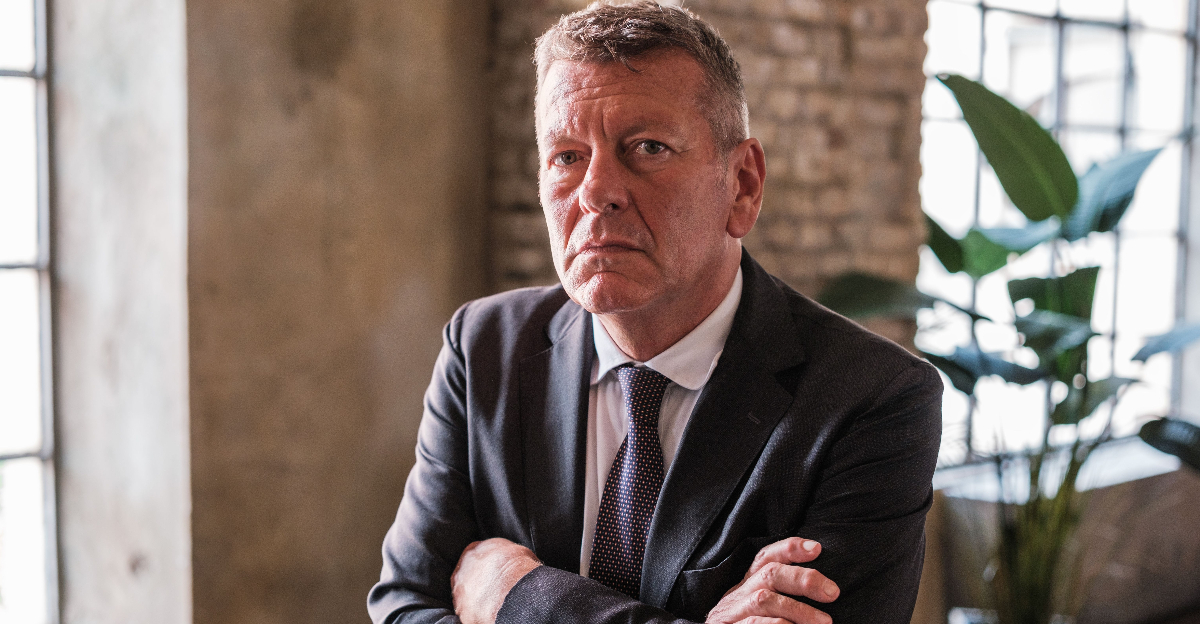 boss in his office with a serious face