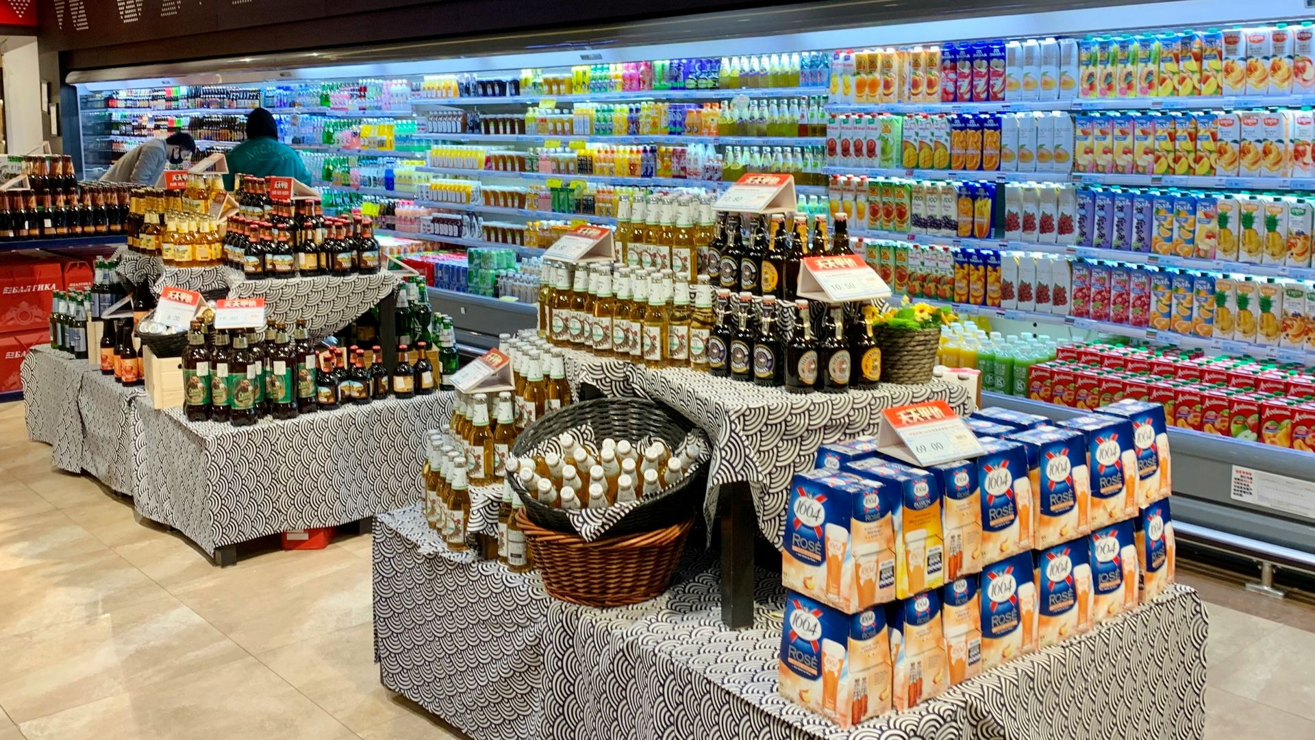 brown and white plastic crates on white metal rack