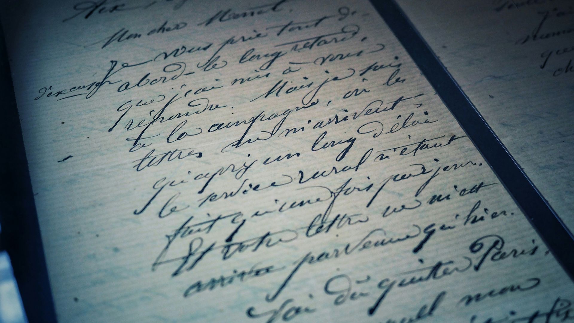 open pad with calligraphy letters