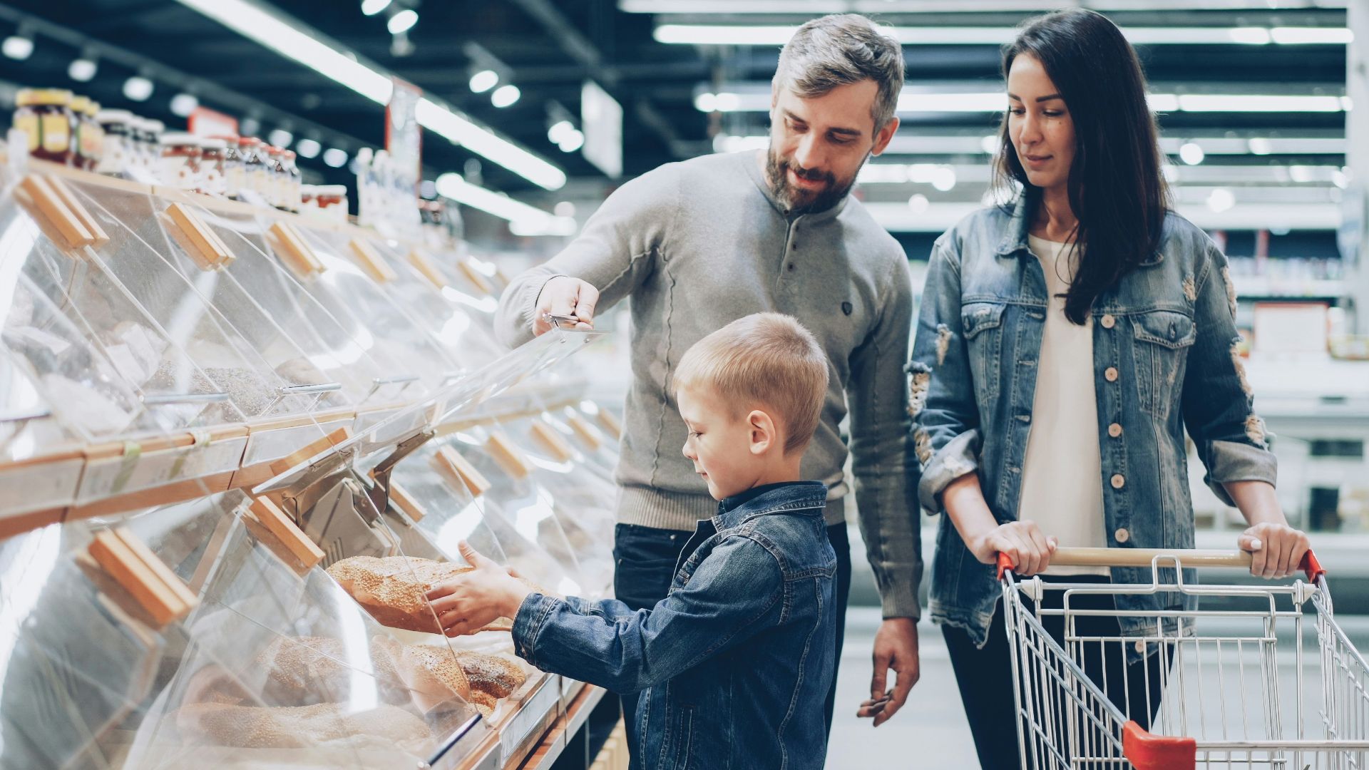 Family is shopping at a grocery store.