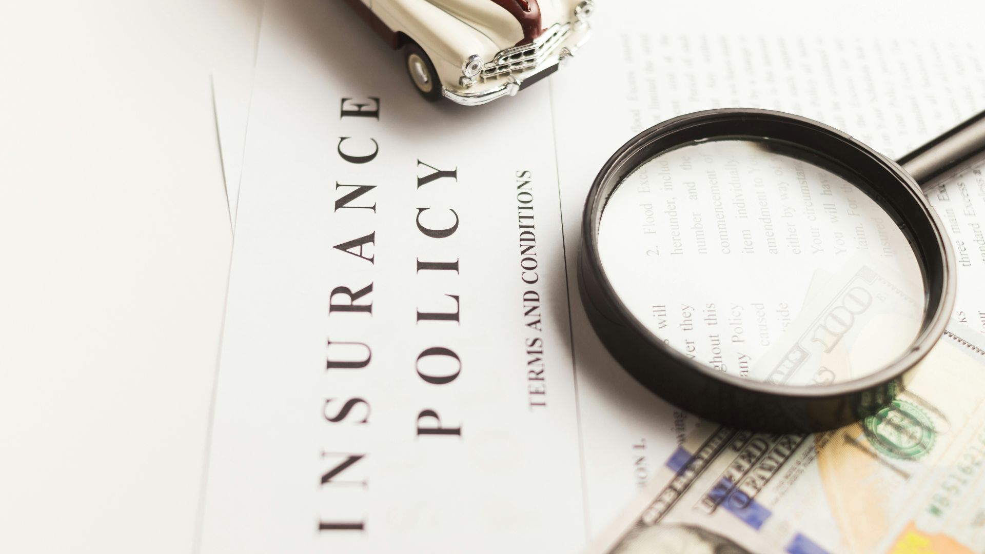 a magnifying glass sitting on top of a piece of paper