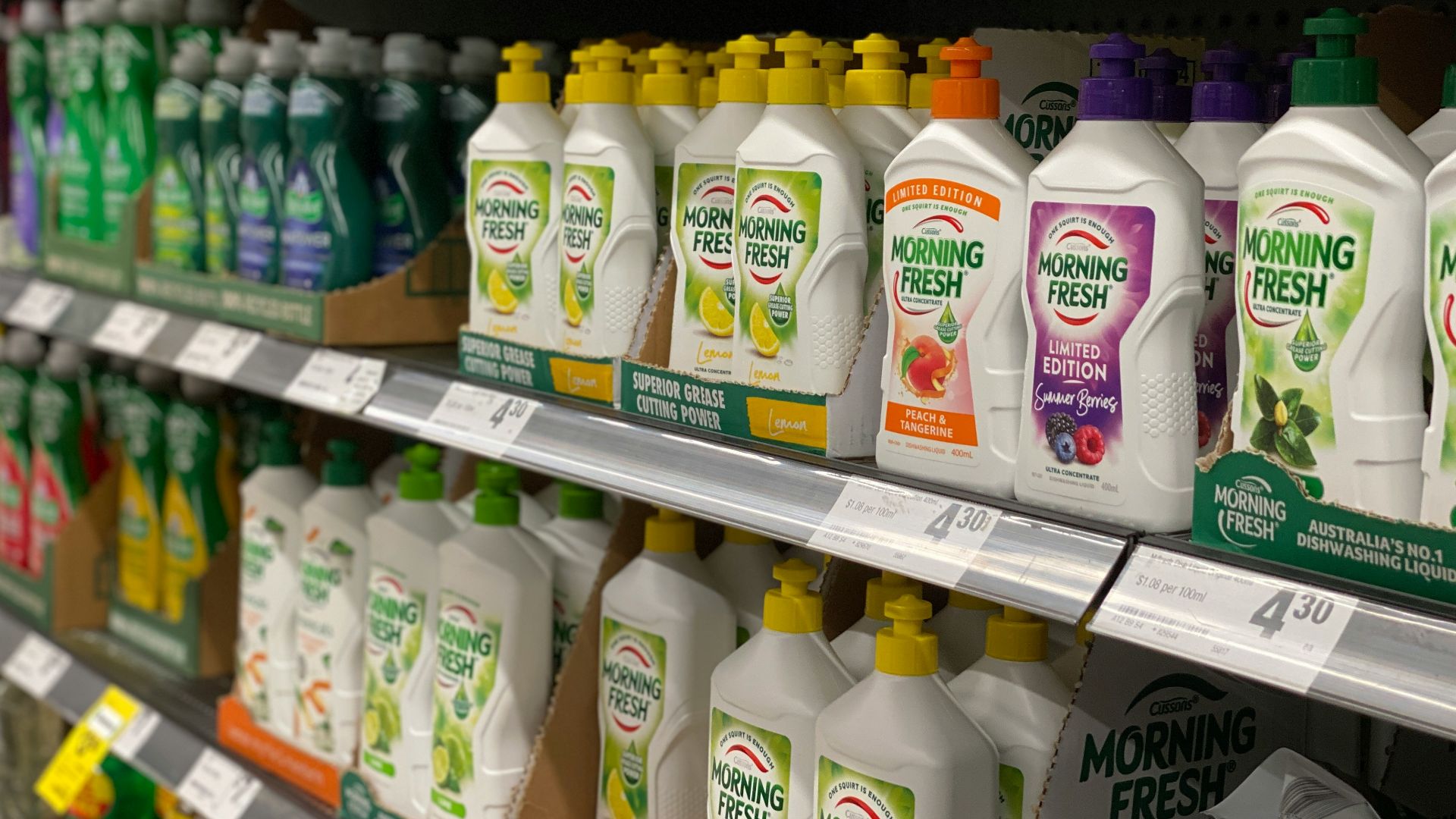 a display in a store filled with lots of bottles of cleaning products