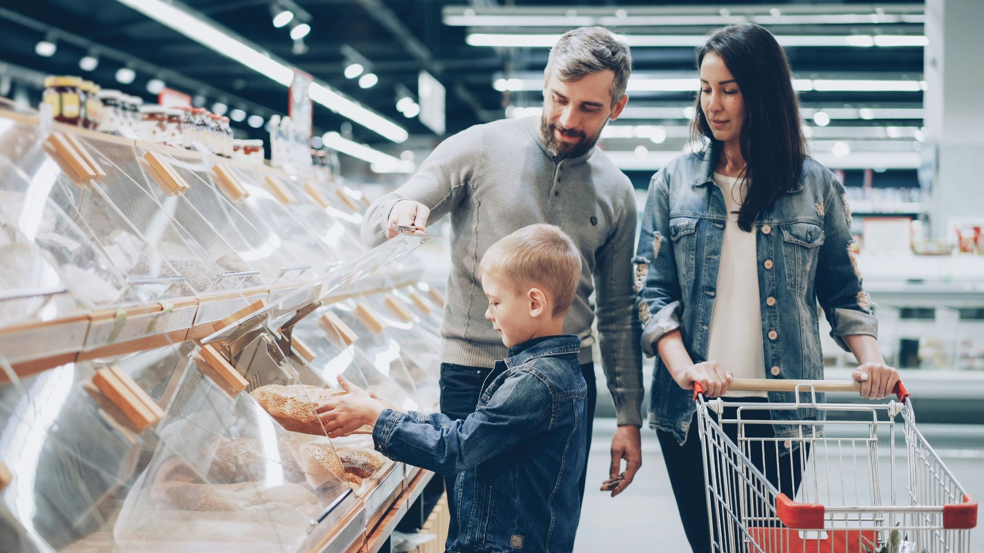 Family is shopping at a grocery store.