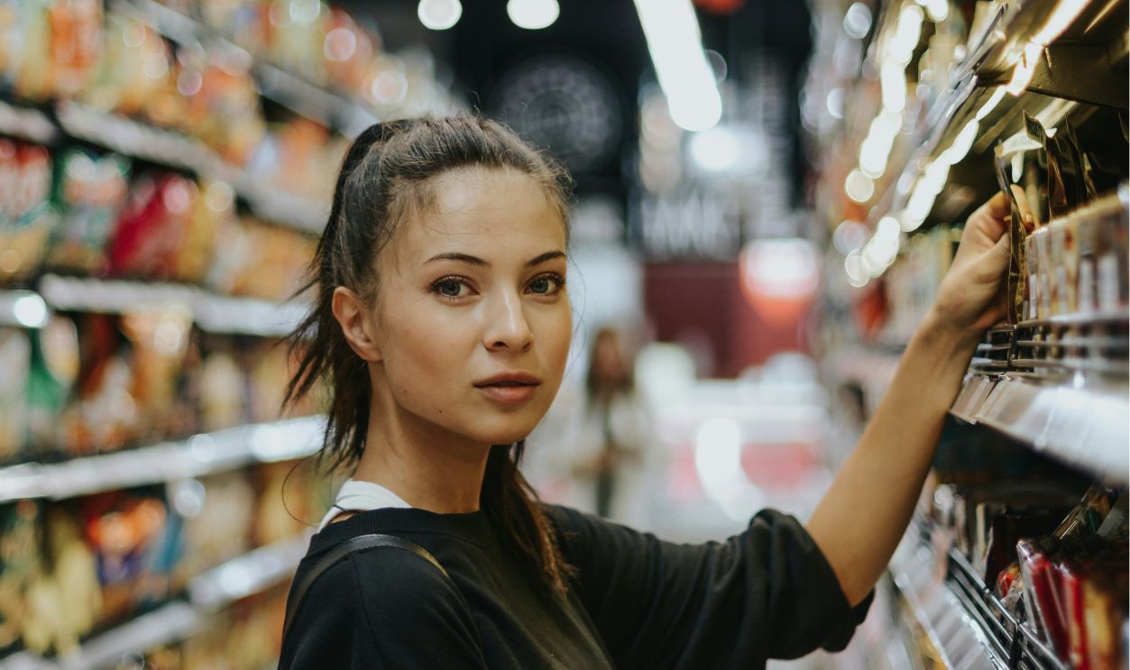 Woman shopping in grocery store 