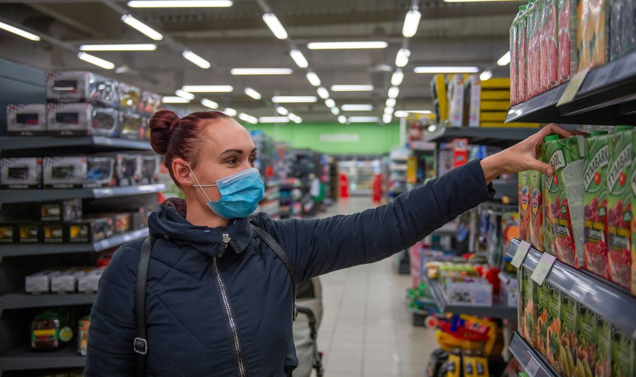 Woman shopping in grocery store