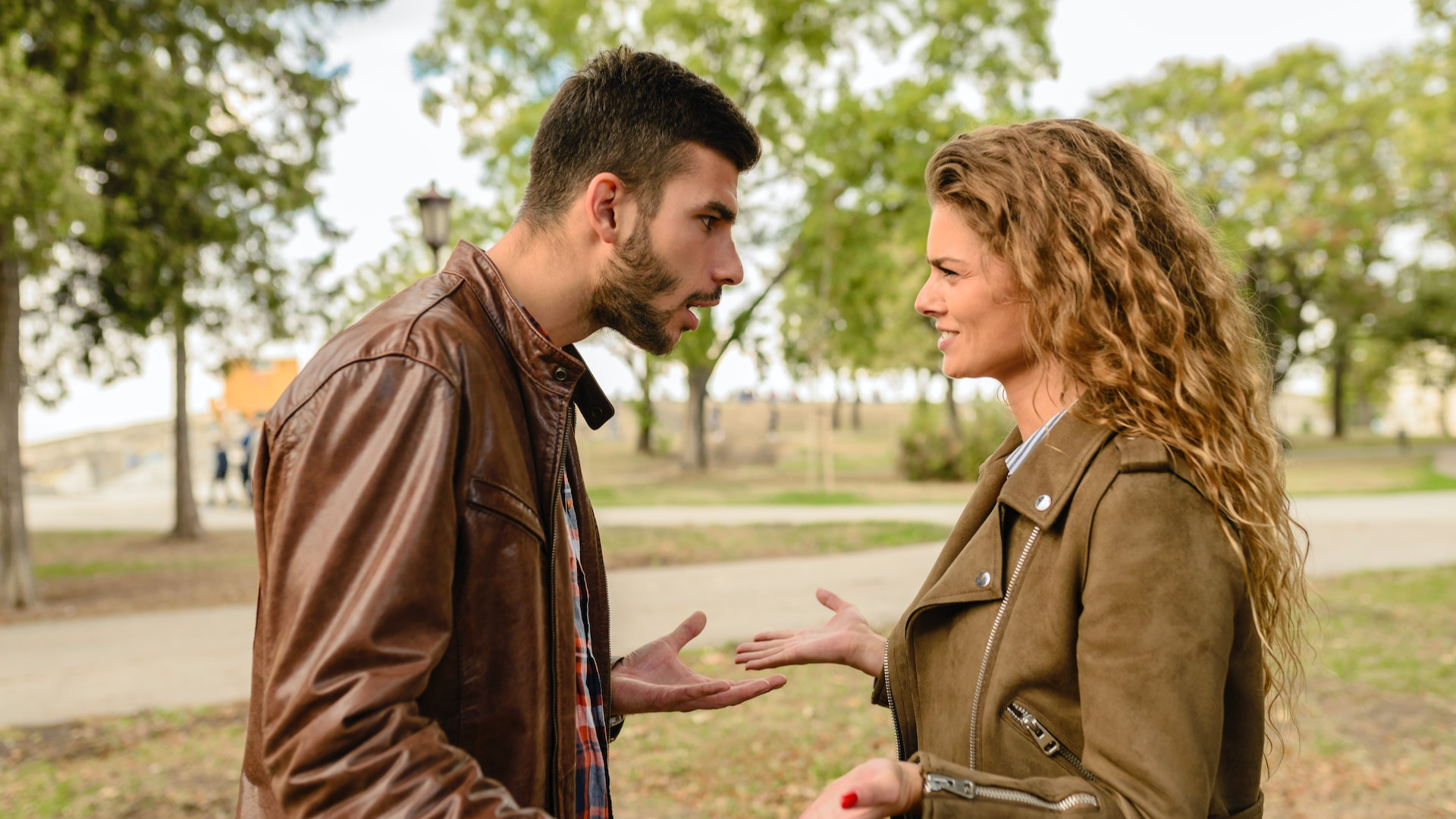 Man and woman having argument at a park